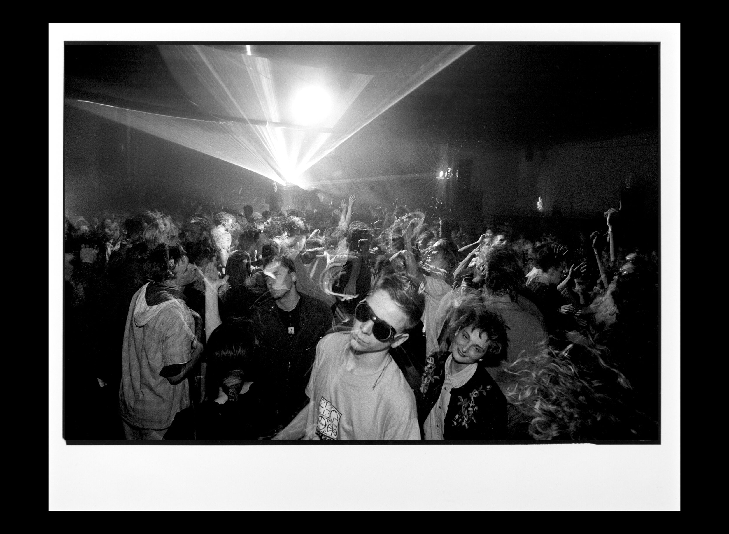  Dancers at techno rave in East Berlin's "House of Young Talent," hosted by hip young West Berlin entrepreneurs.  