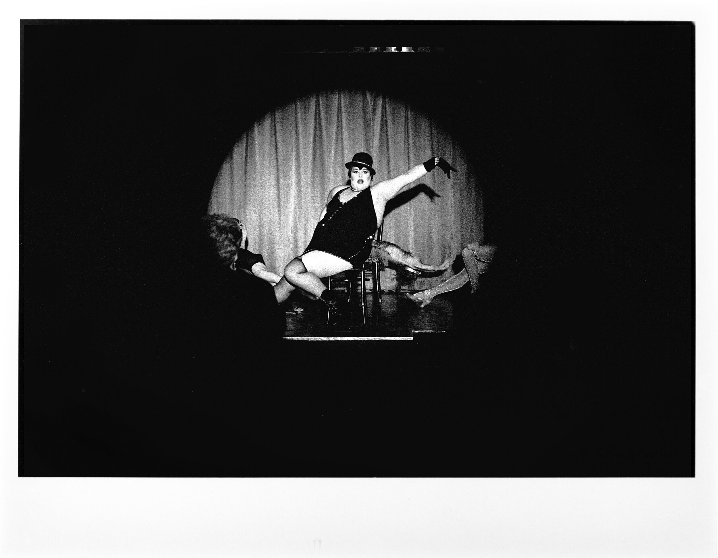  A drag performer at La Vie en Rose, a cabaret in a mall on the Kurfurstendamm in West Berlin.  