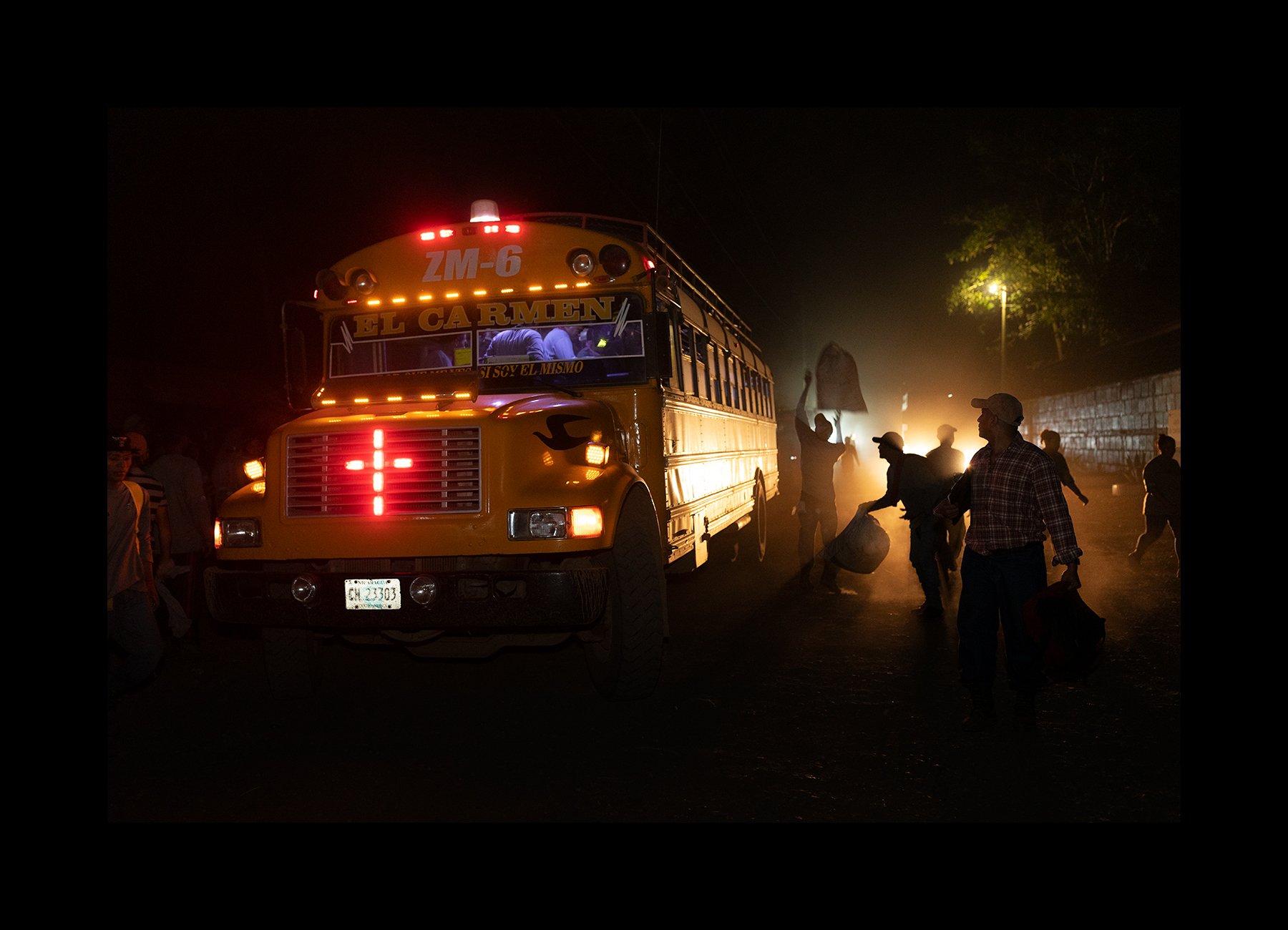  Sugar cane cutters load onto buses in the early morning to head into the fields for a hard day of work at the Ingenio San Antonio (San Antonio Sugar Mill), in Chichigalpa, Nicaragua on Feb. 24, 2020. 