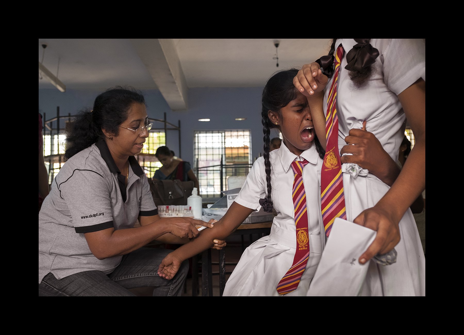   Students are tested for CKDnT at their rural secondary school in Rajanganaya, Sri Lanka on June 28, 2016. With the support of the government, a local CKDnT organization performs a mass blood screening of 342 students. This area in the North Central