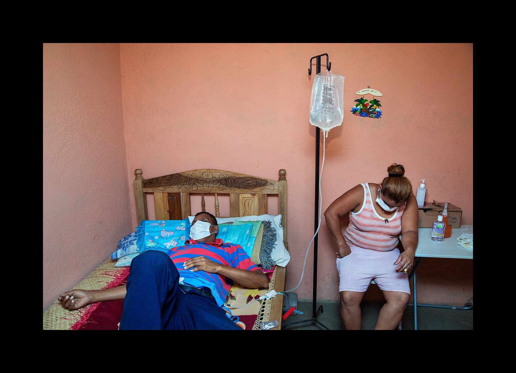  Former sugarcane worker, 57, receives dialysis at home with help from a family member where they live in Chichigalpa, Nicaragua on Jan. 9, 2013. He suffers from end stage kidney disease after working in the fields for decades without access to water