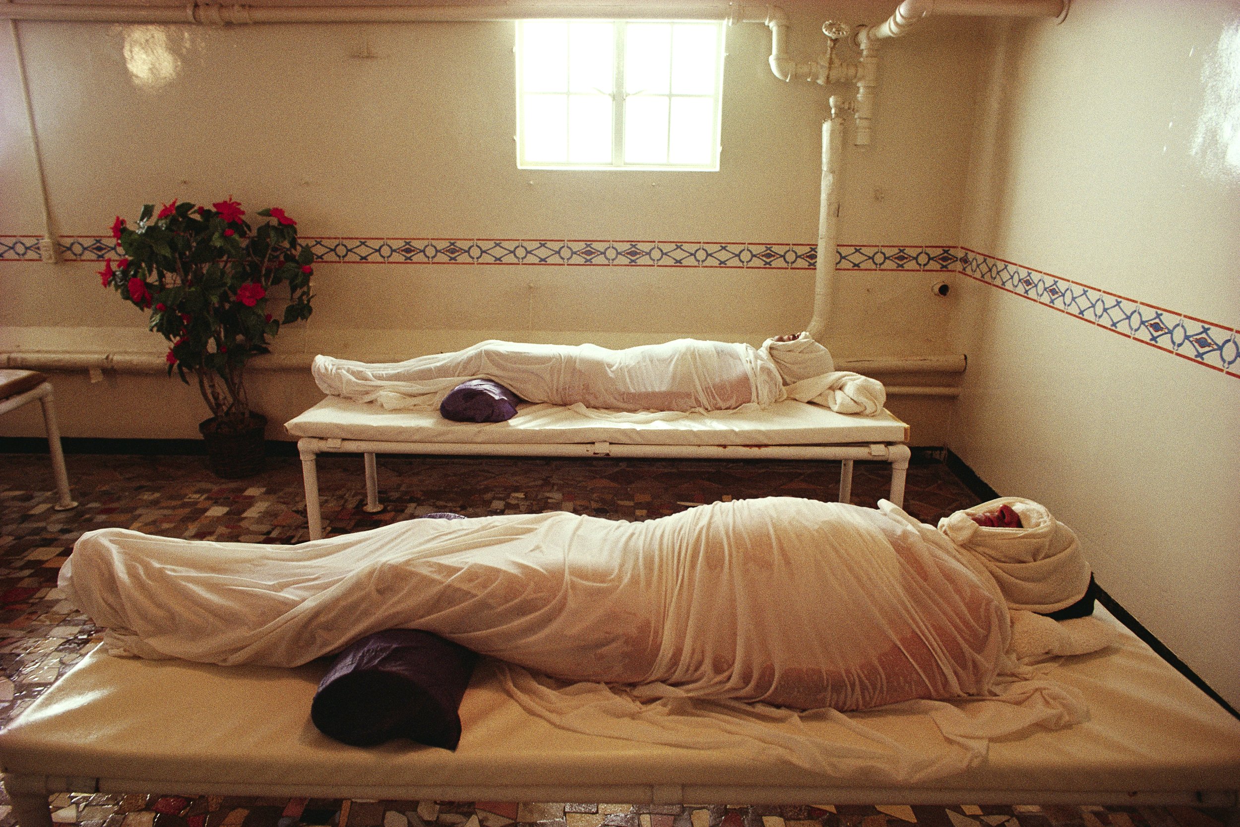  Spa patrons undergo a cold wrap after a steamy mineral bath at Murrieta Hot Springs. 1988 