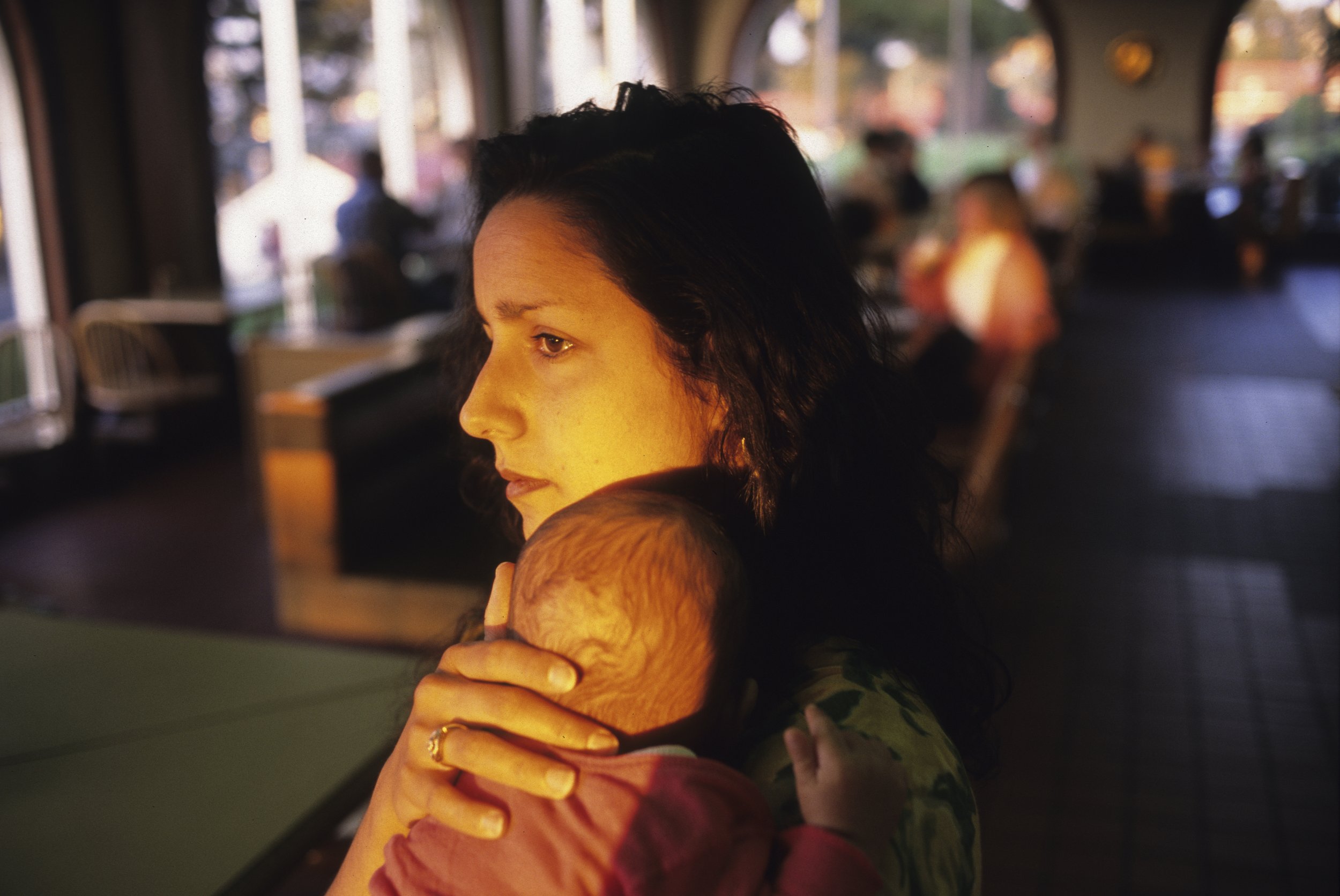  Julie Winokur holding our newborn son Elijah in San Francisco. 1995 