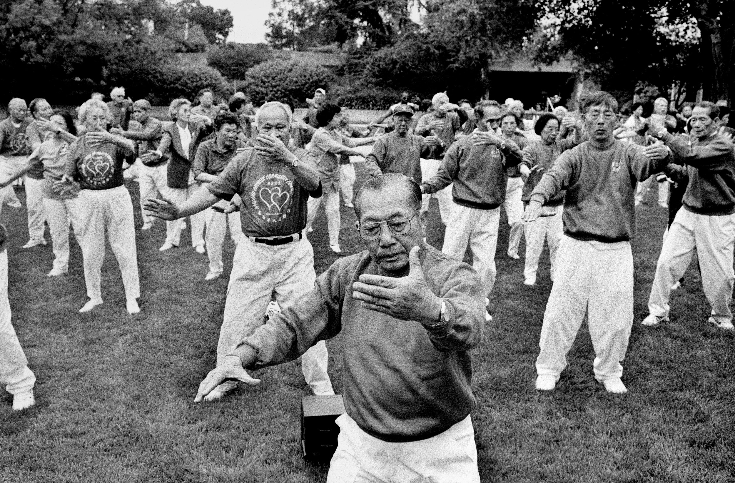 Seniors gather for a morning tai chi class on the lawn of the Oakland Museum. 2000 