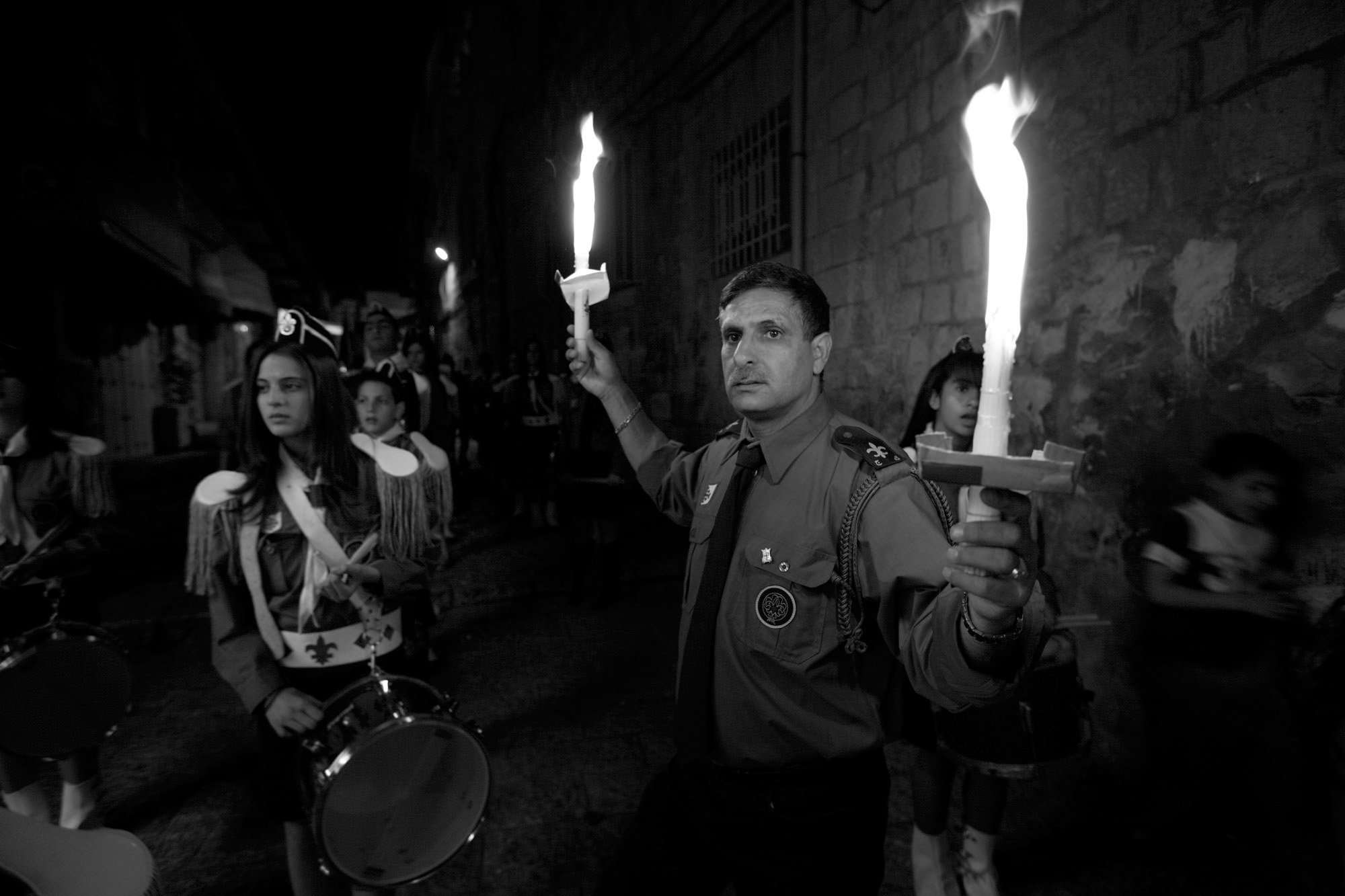  Palestinian Catholics celebrate their faith in the streets in the Old City of Jerusalem. 