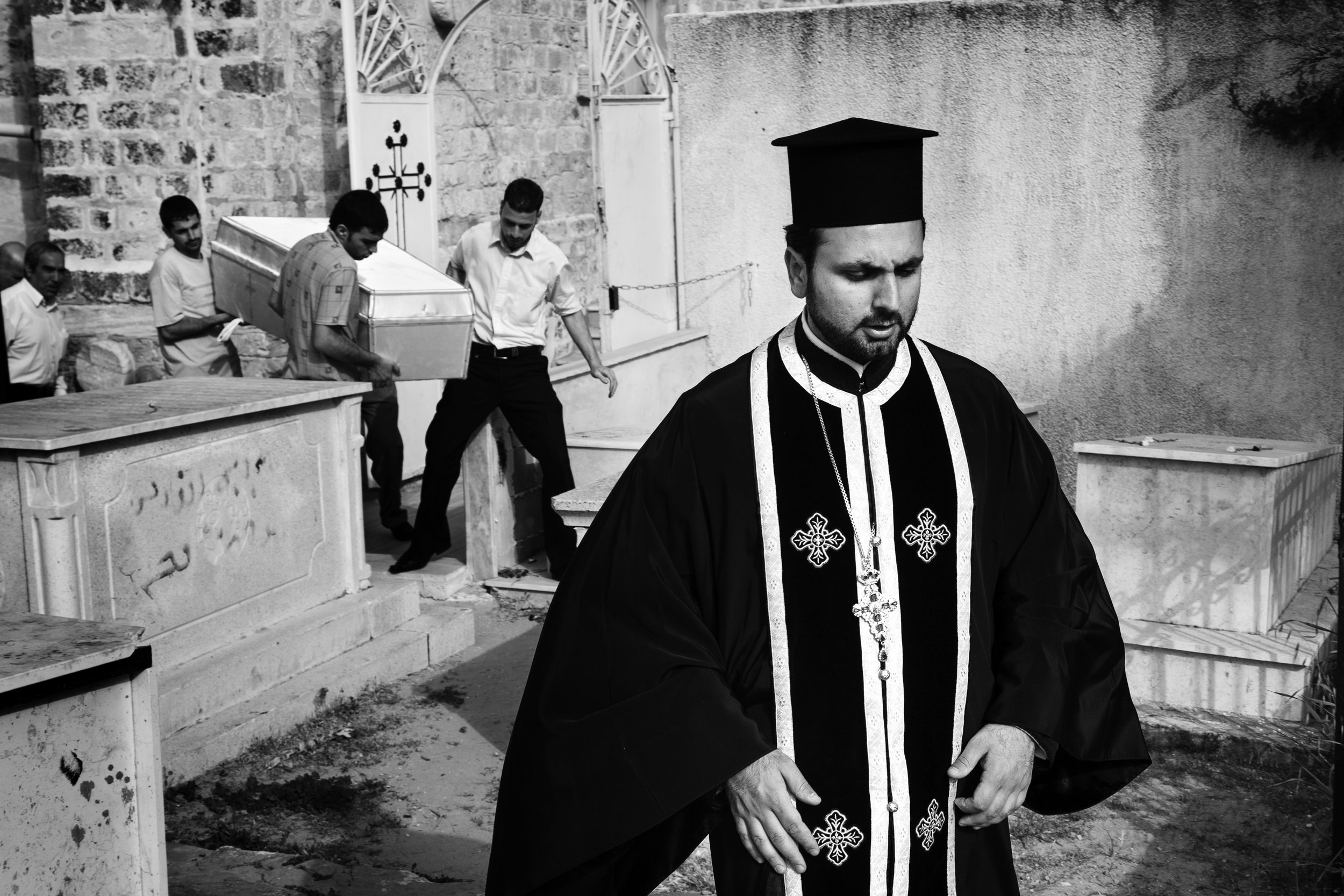  The funeral of 95 year-old Om Saleem takes place at the fifth-century Greek Orthodox Church of St. Porphyrious in Gaza City, Gaza, Palestine, on March 25, 2008.  