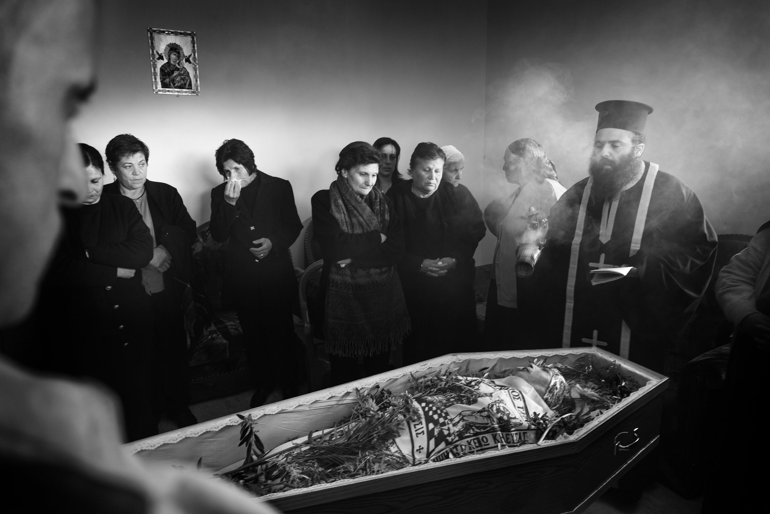  Rituals are performed for Sa'ad Yacoub Issa who was buried in West Bank, Palestine in 2008. With no family left behind to mourn Issa's passing, residents from a small Palestinian village came out to honor her with a traditional Greek Orthodox ceremo