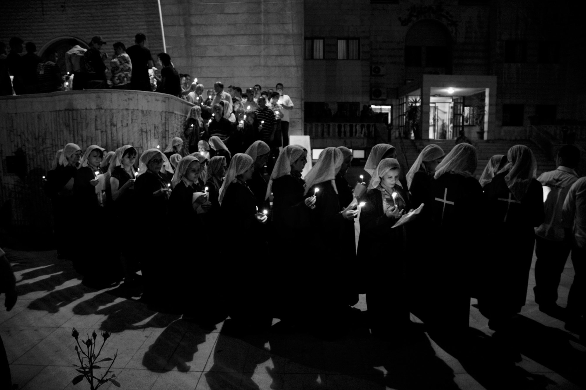  Iraqi Catholics partake in the Easter services at the Ibrahim Khalil Chaldean Church, located in the Jaramana district of Damascus, Syria on April 26, 2008. 