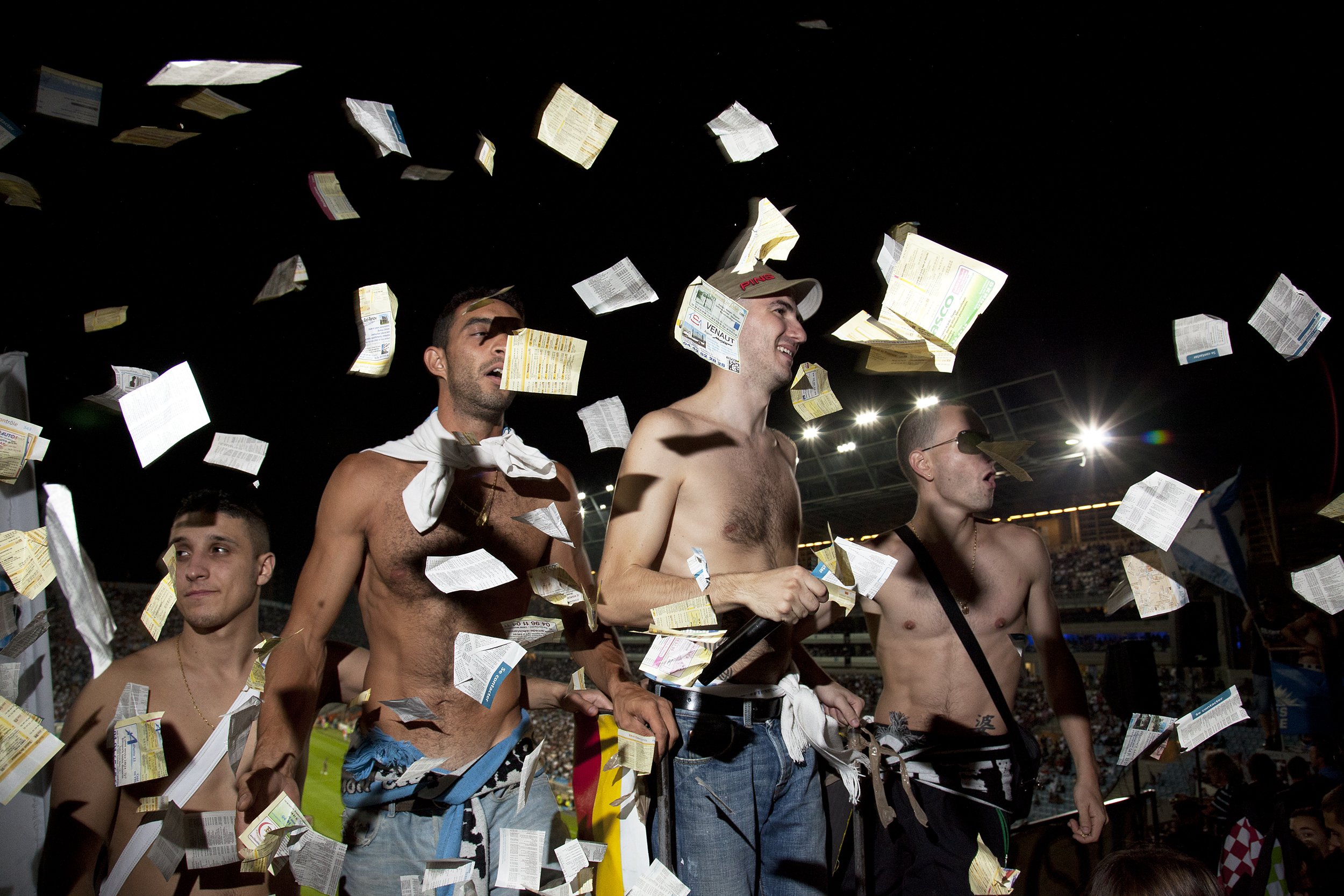  Olympic Marseille Football Club supporters with Marseille Trop Puissant (Marseille Too Powerful) cheer on their team during a French Champions League match against Monaco in Marseille, France on Sept. 12, 2010.  