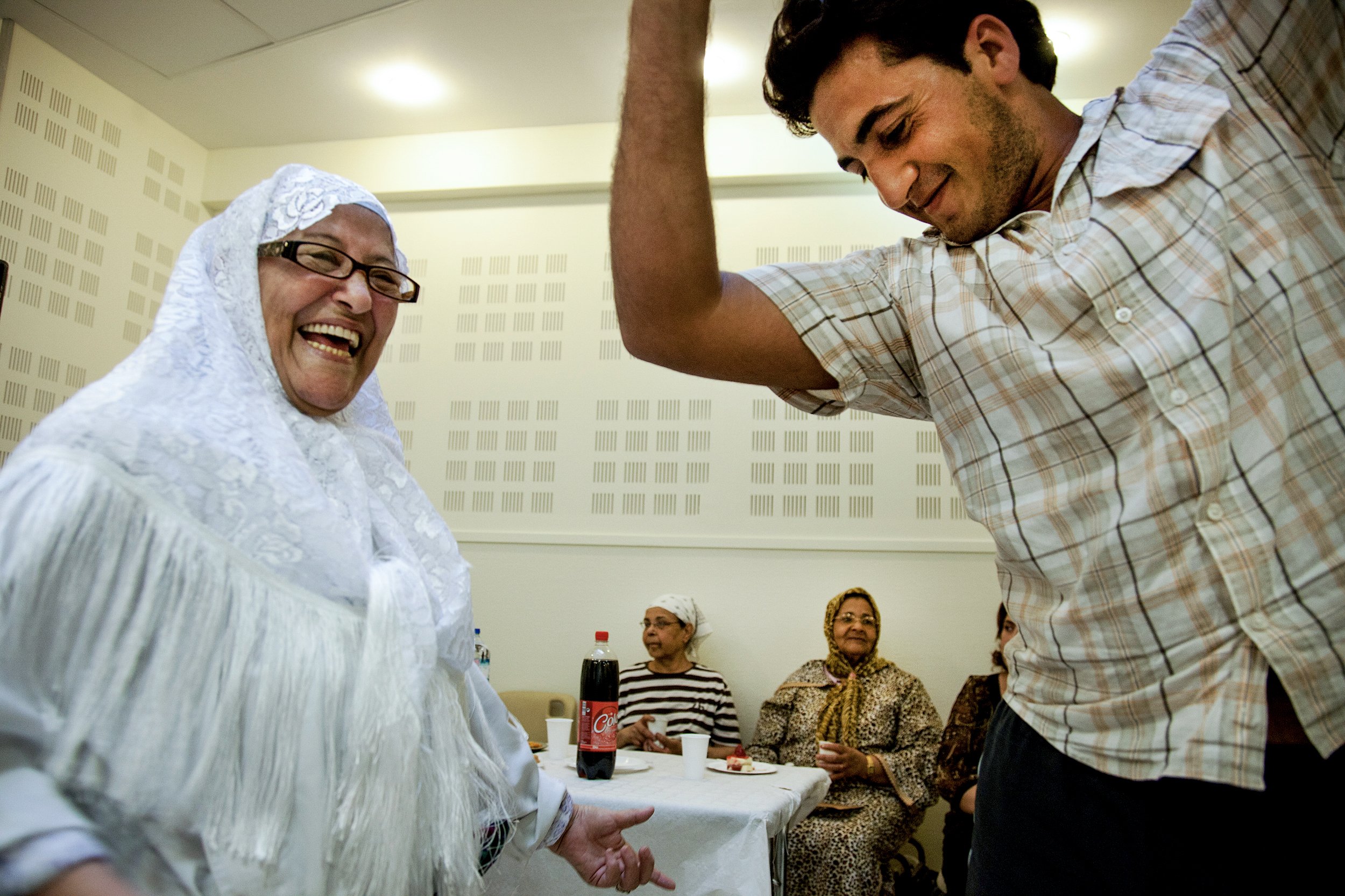  In the Union of Muslim Families, started in 1996, elders of the community dance during an Eid al Fitr celebration in Marseille, France on Sept. 14, 2010. 