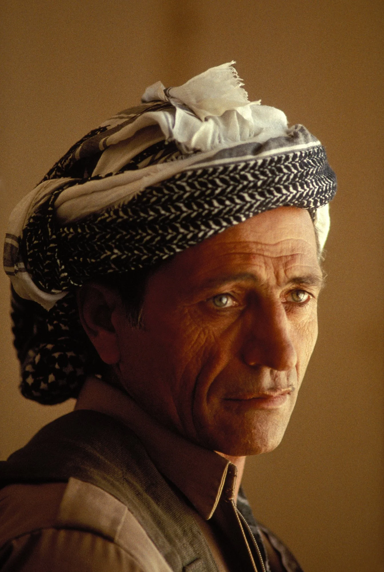 Portrait of a Kurdish Pesh Merga fighter in northern Iraq after the Gulf War in 1991.