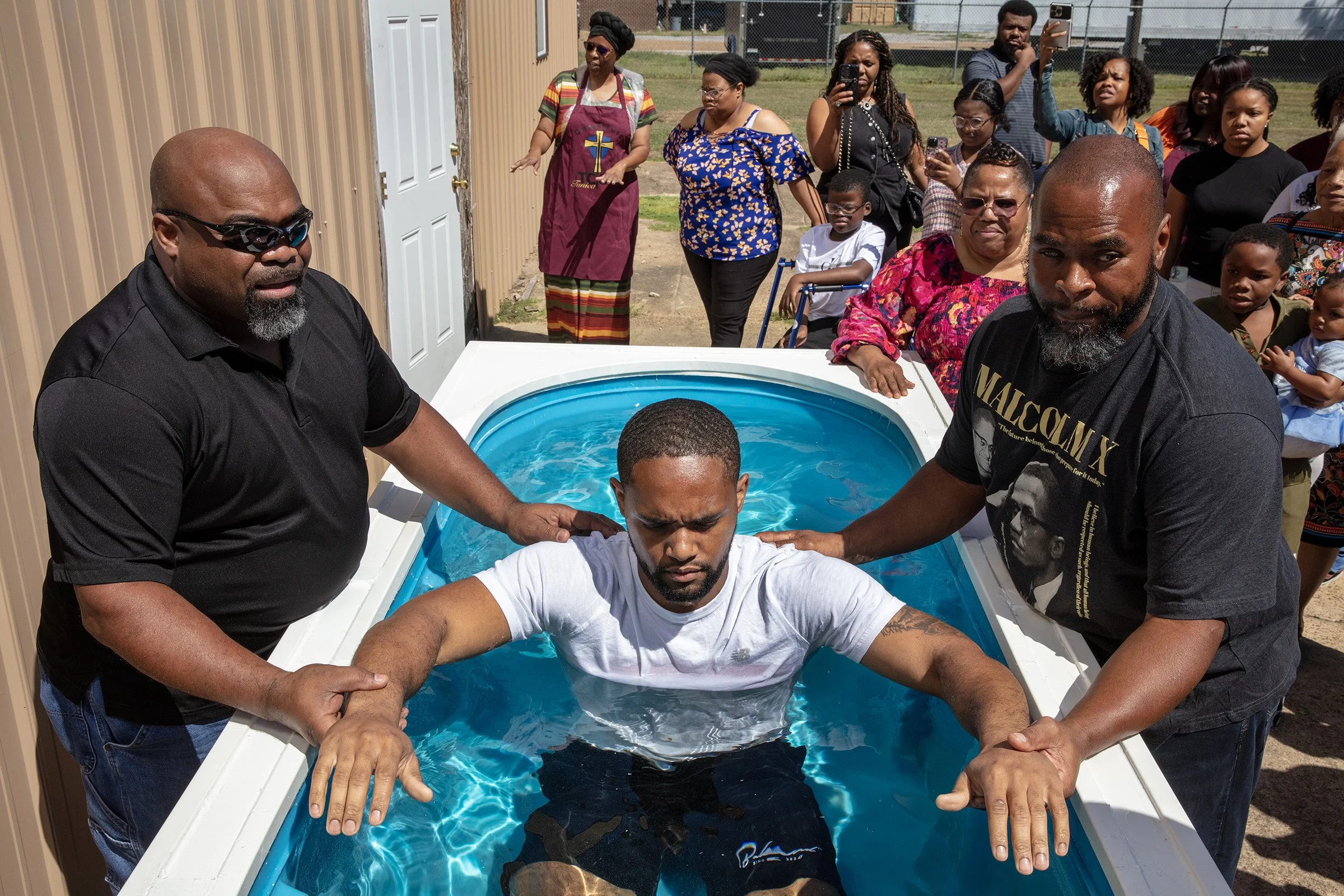  The baptism of Blake Bland, 25, Christi Miller’s cousin during Sunday services at the Tunica Church of God in Tunica, Mississippi on September 7, 2025. 