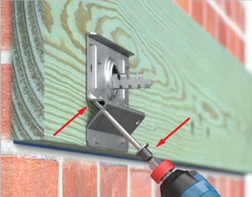 Decks attached through brick veneer