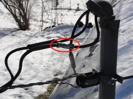 Overhead powerlines, trees, and exposed connectors: who fixes what