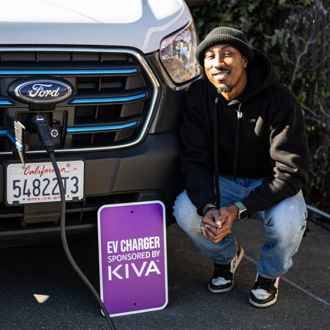 Man charging delivery vehicle at 7 Stars.