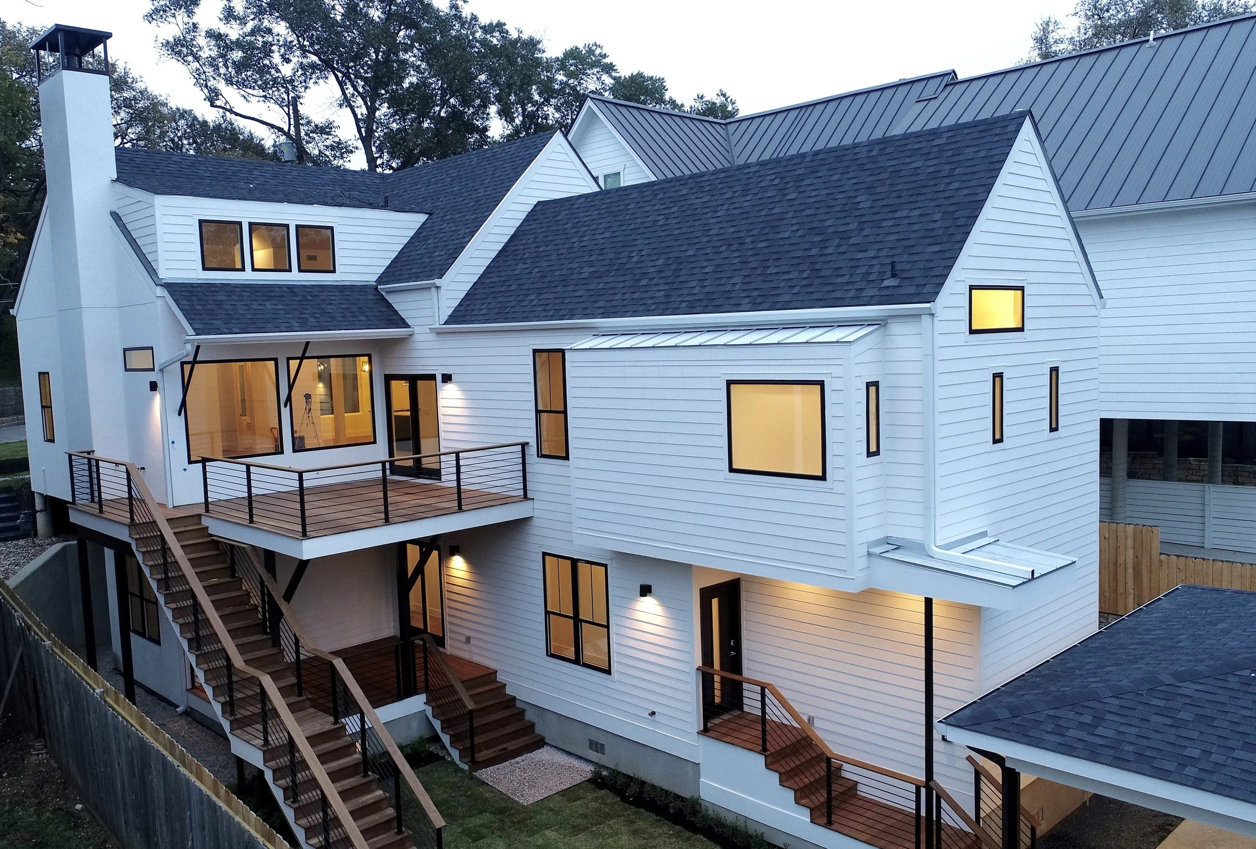 Atx Grandview custom multi-level home exterior back view. 