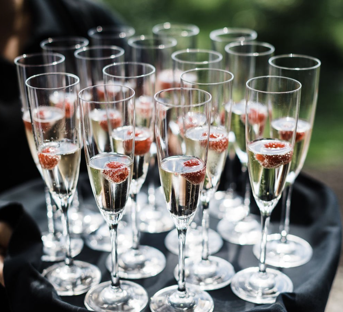 tray passed champagne with berries