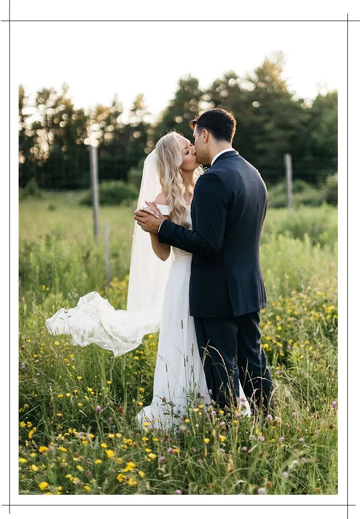 wedding couple kiss in wildflower field at NH wedding venue