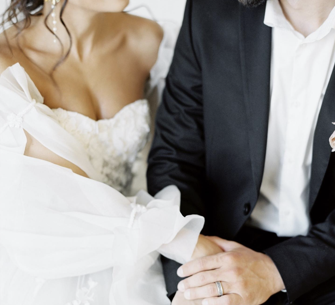 wedding couple holding hands