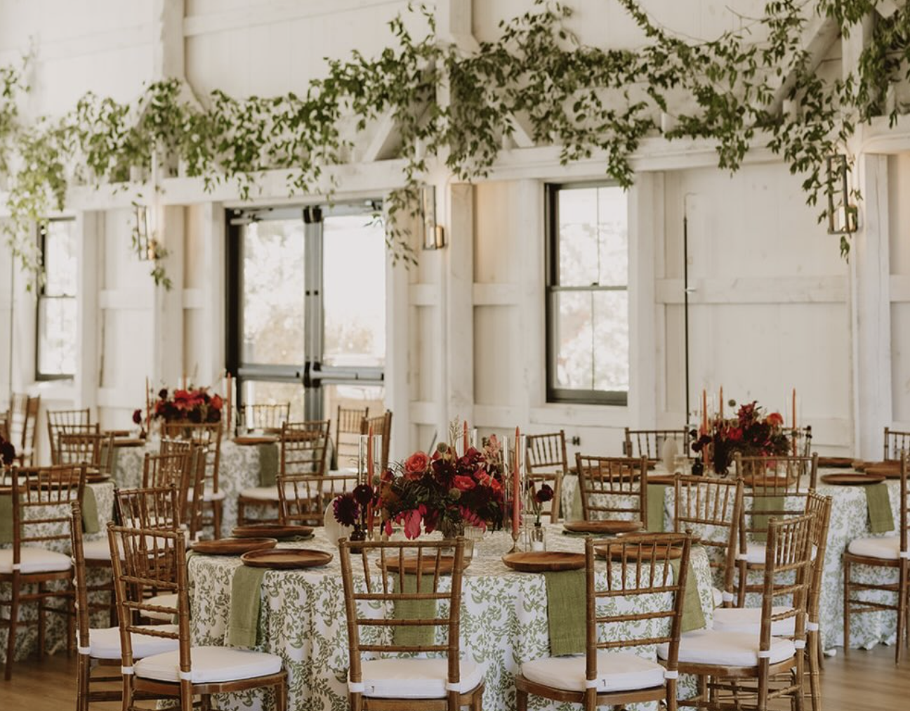 indoor white barn wedding reception
