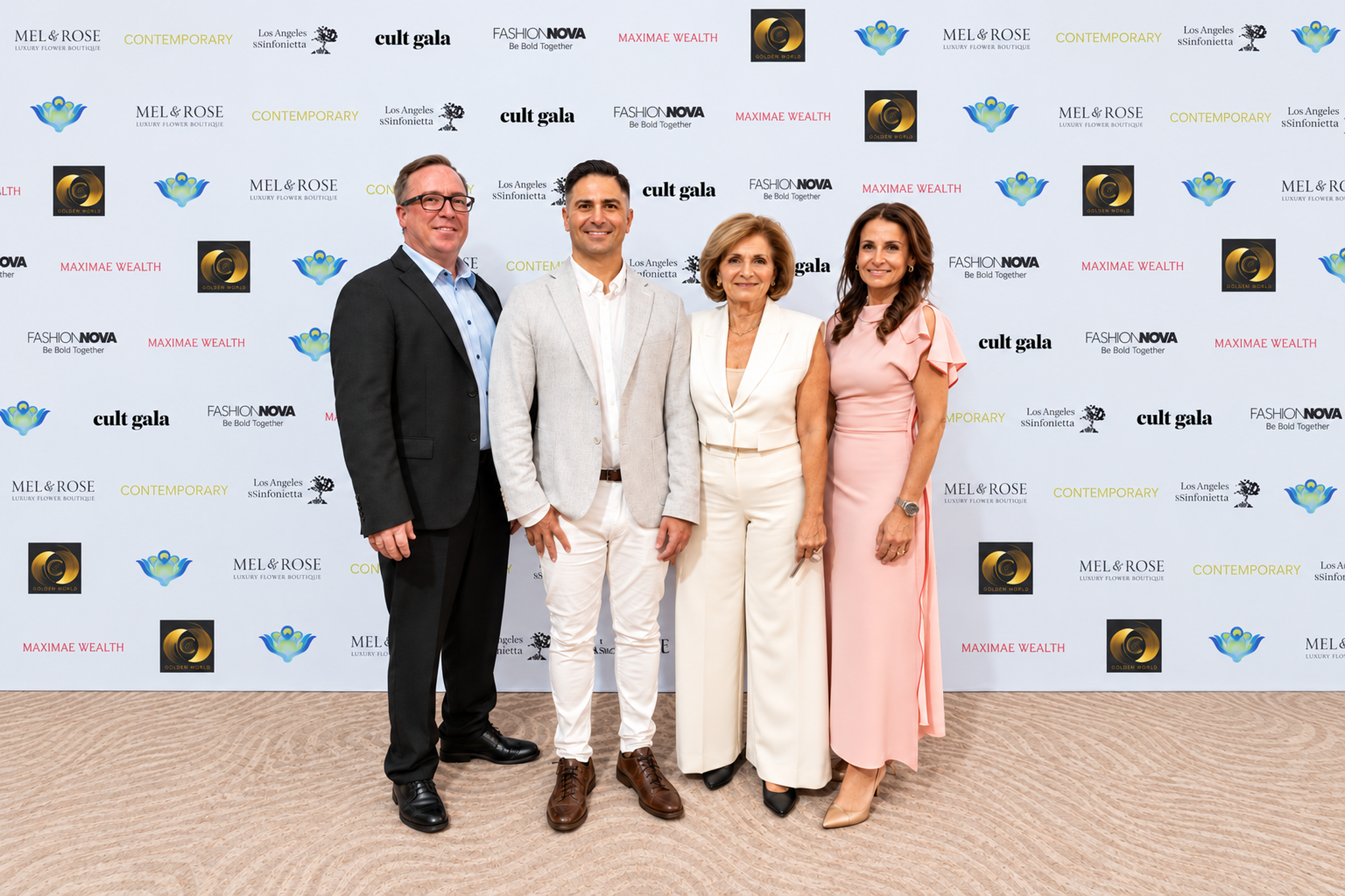 04-four-guests-at-sponsor-wall-2048x1365.png