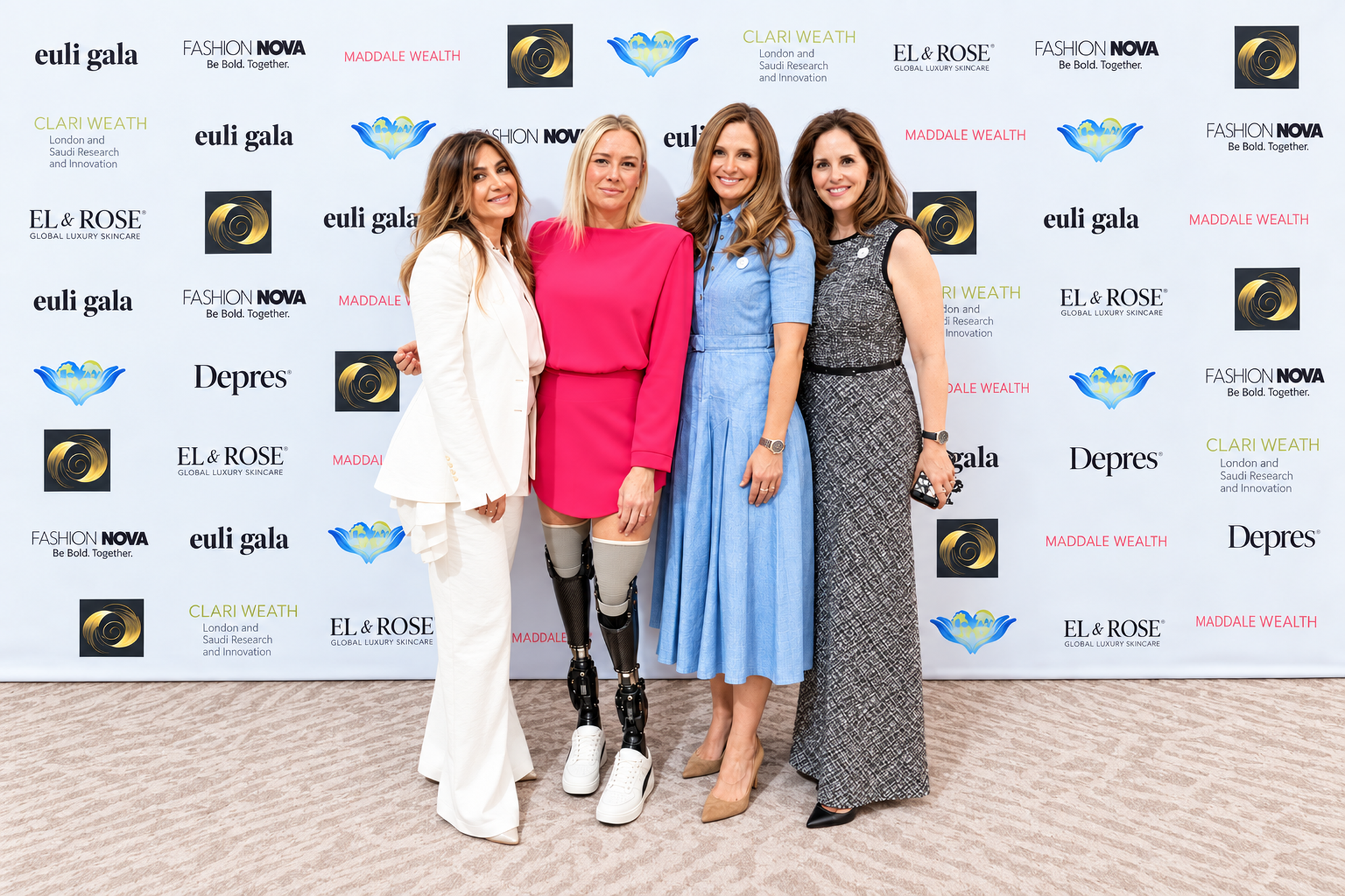 11-four-women-at-sponsor-wall-2048x1365.png