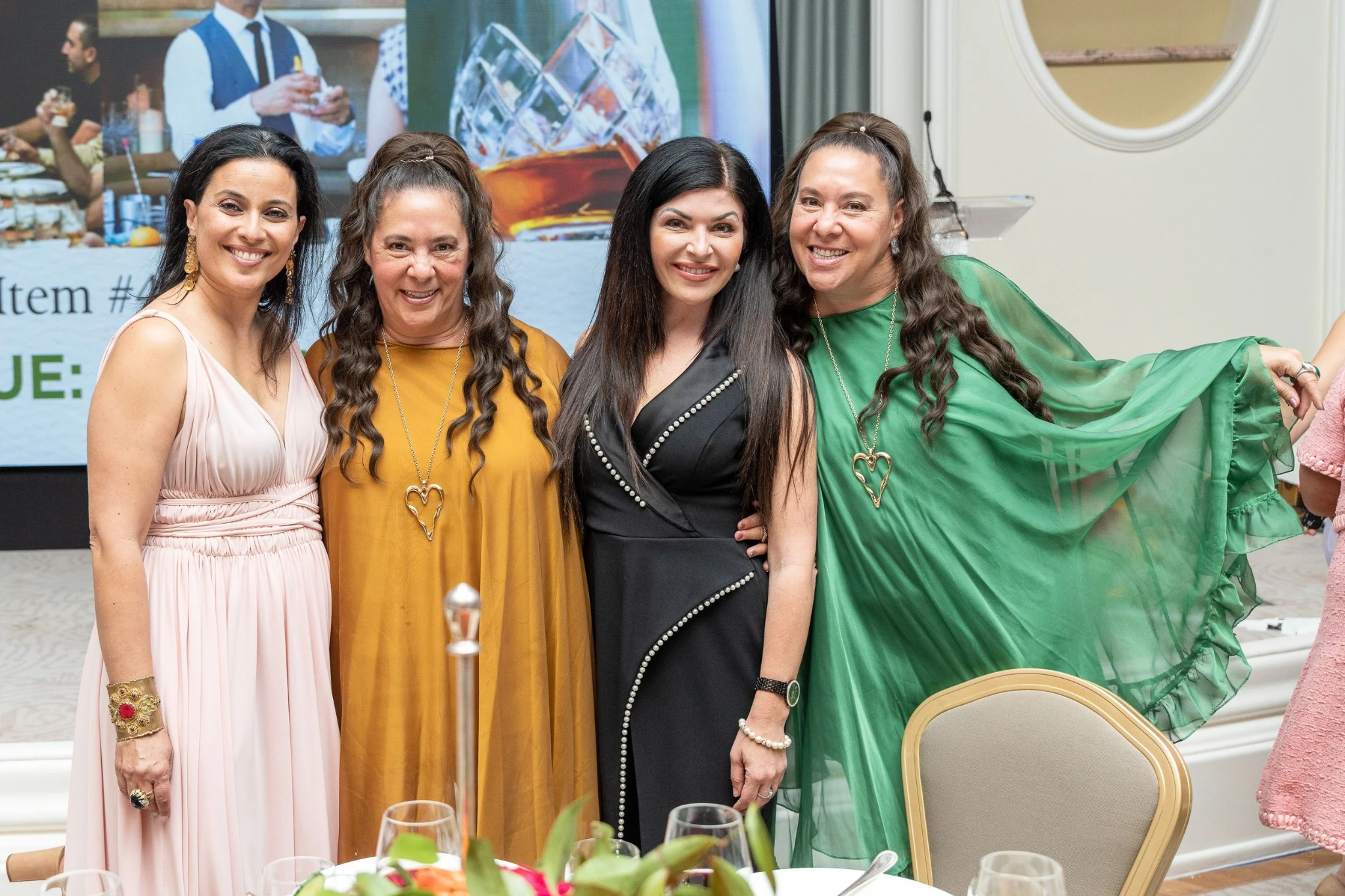 08-four-women-with-green-cape-2048x1365.png