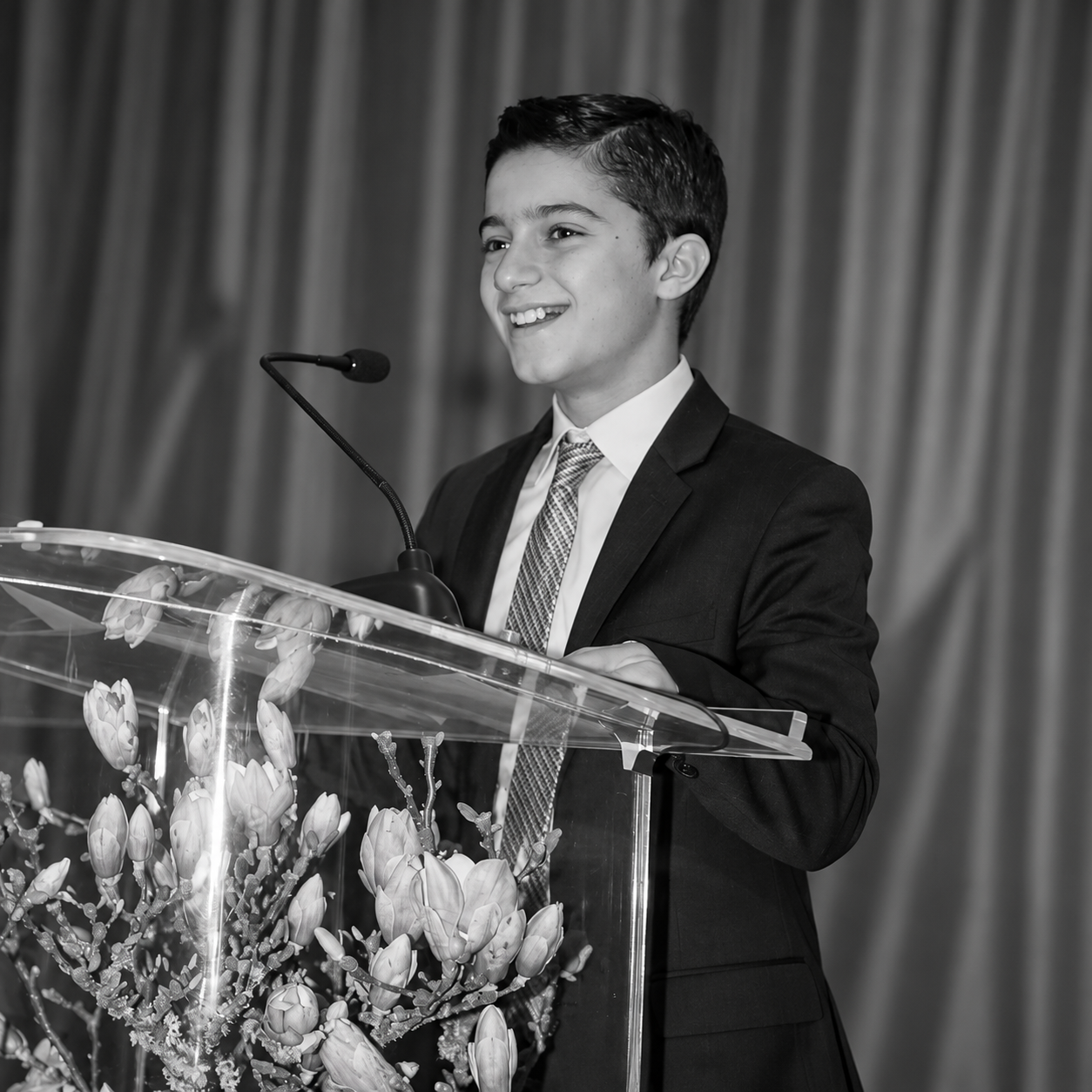 boy giving speech.png