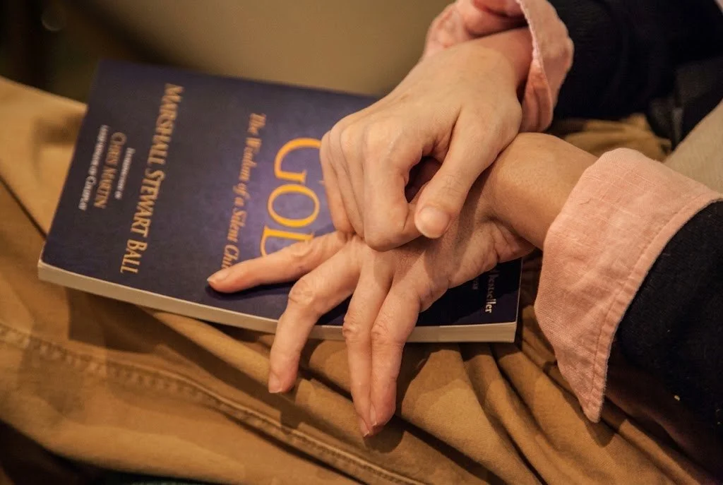 book in girl hand.jpg