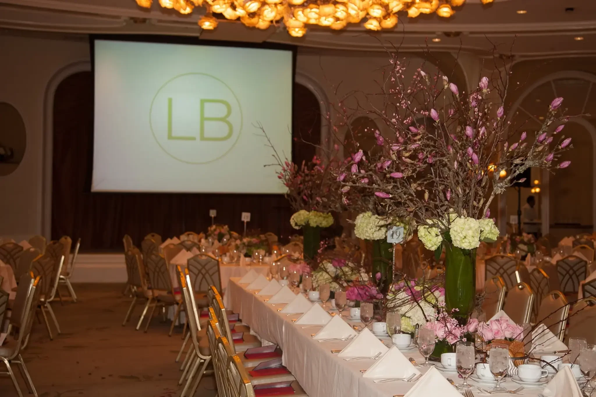 04-banquet-tables-and-floral-centerpieces.webp