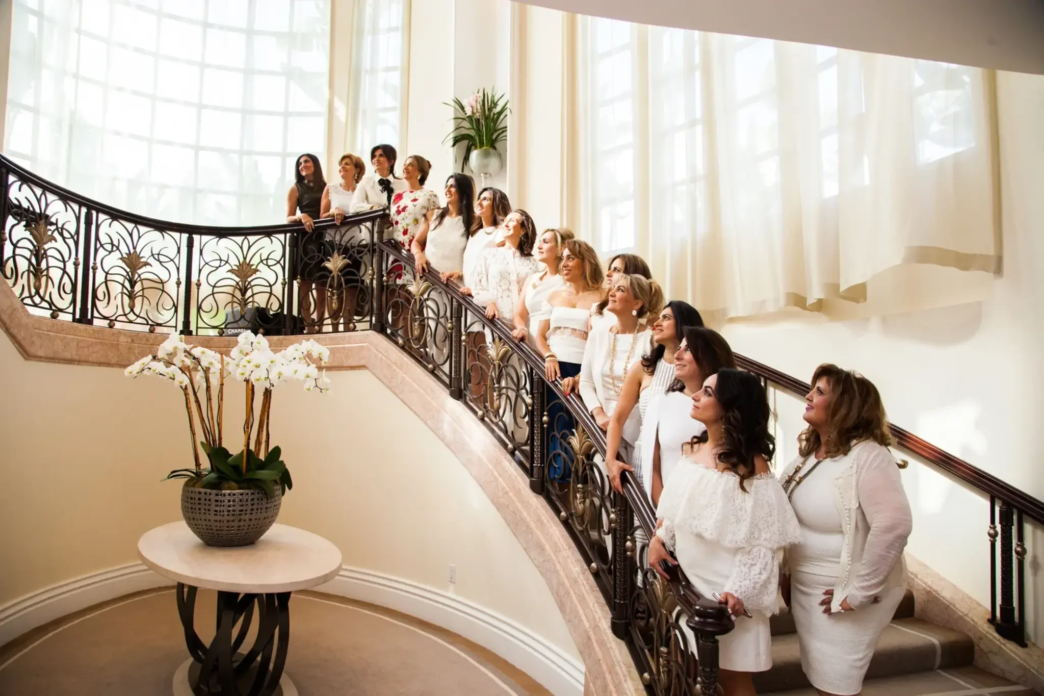 06-women-on-grand-staircase.webp