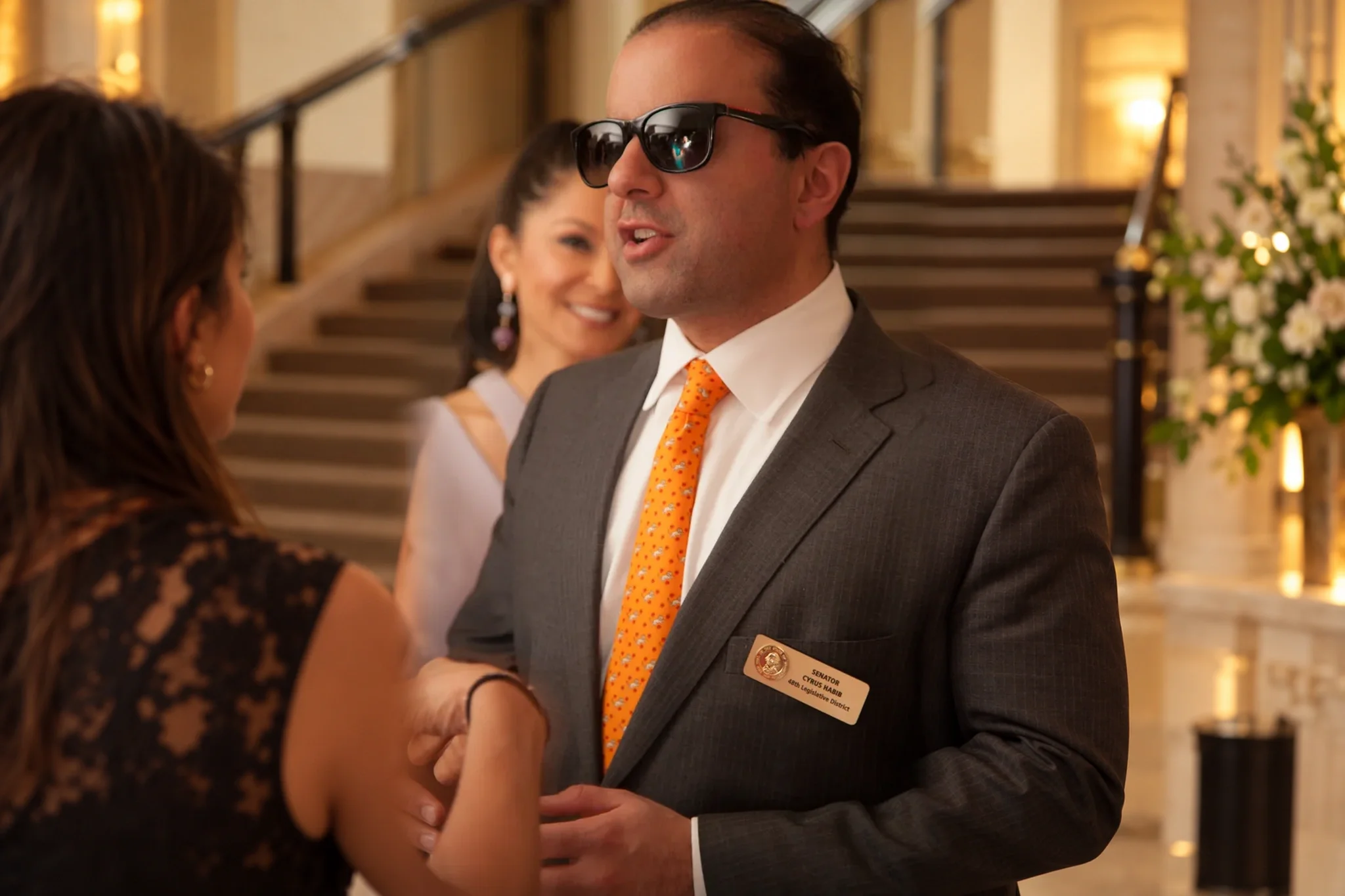 03-man-in-sunglasses-speaking.webp