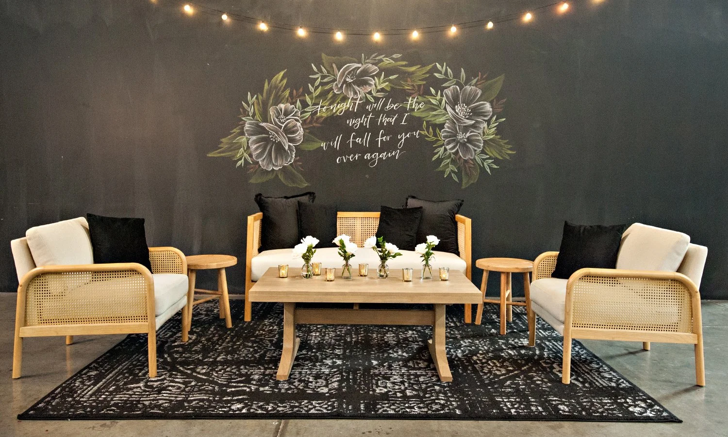 Lounge grouping with bud vases by Flower Lab for a wedding rehearsal dinner in St. Louis.