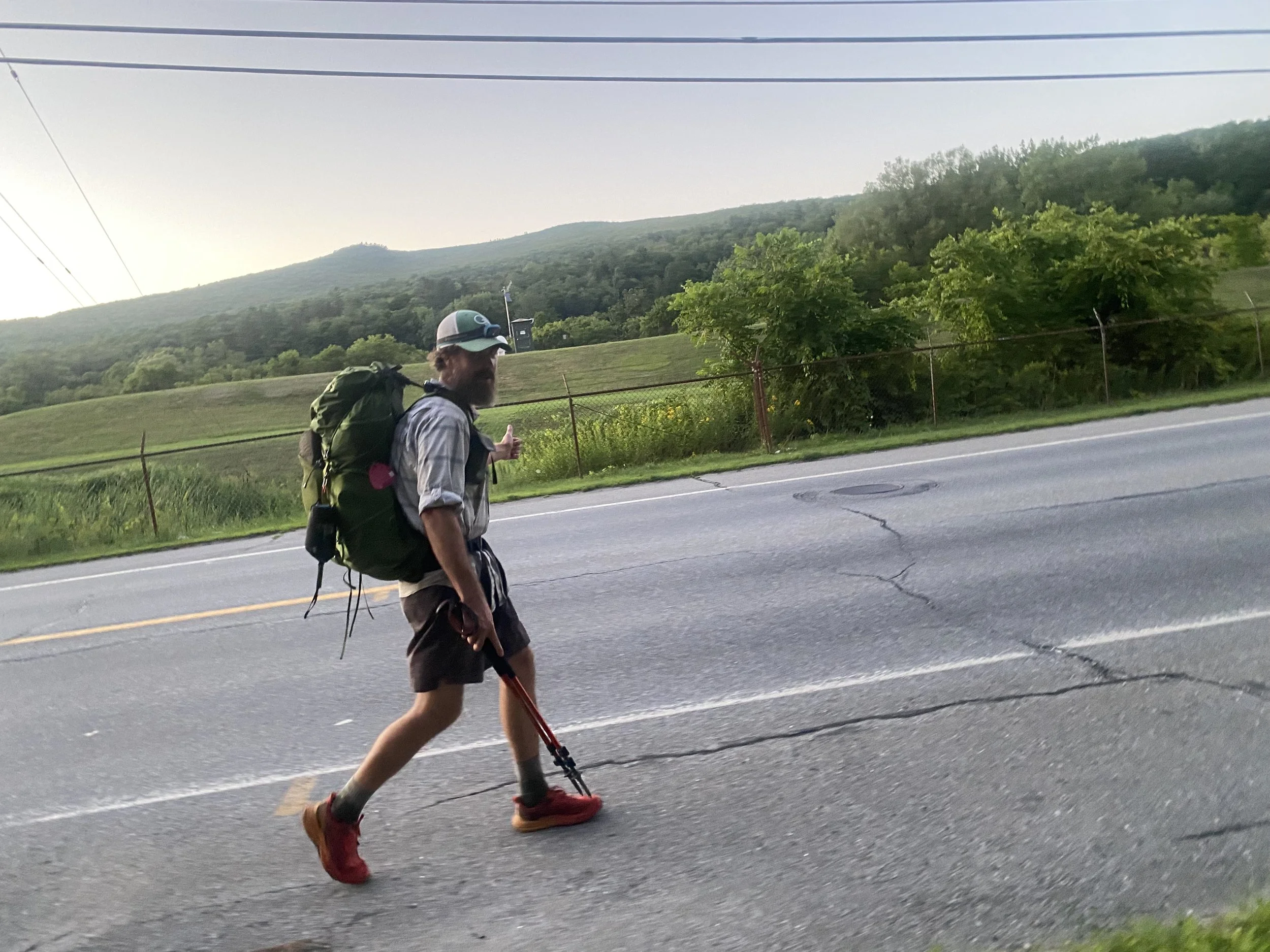 Hitchhiking into town.