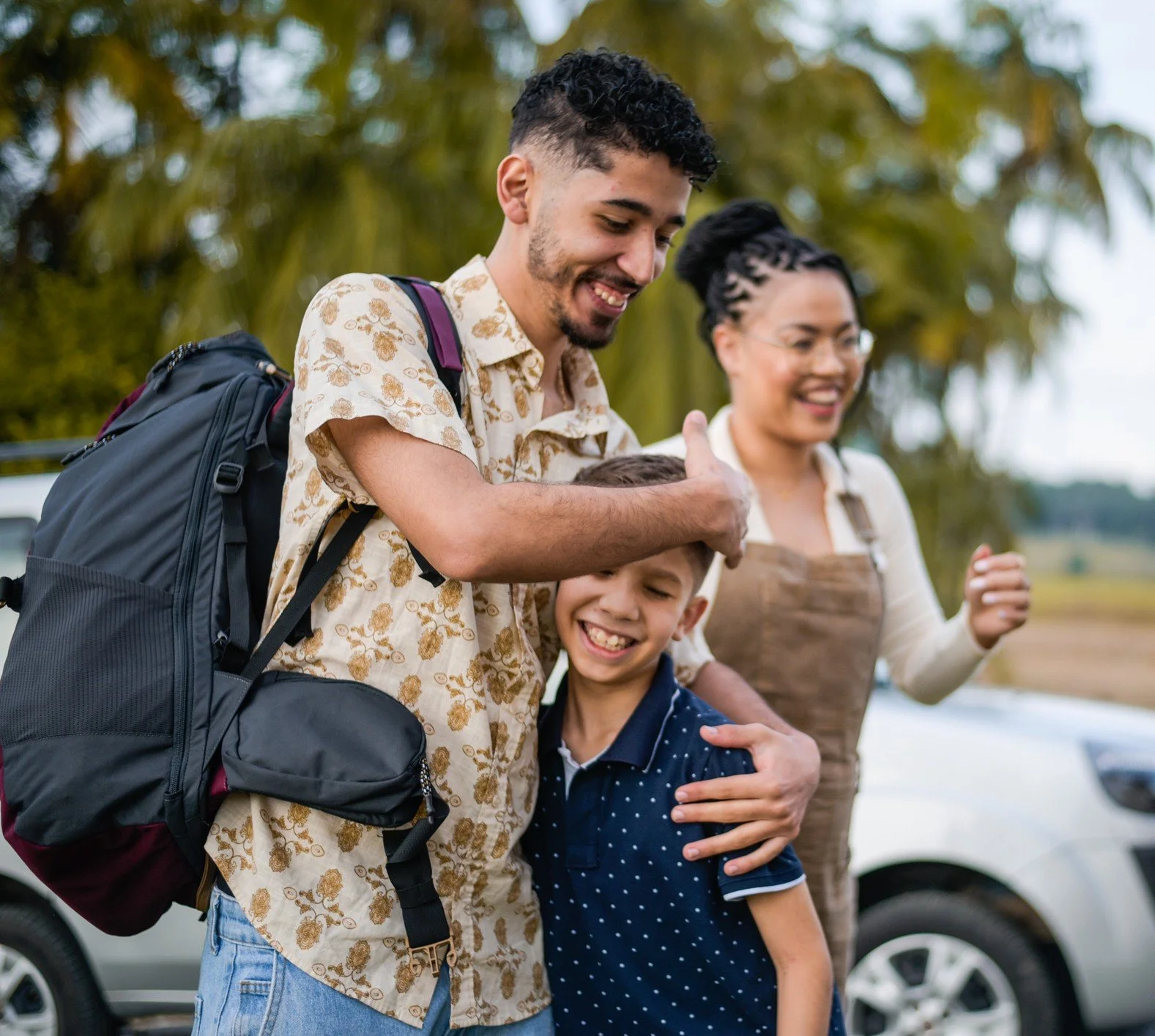 Happy family with their car