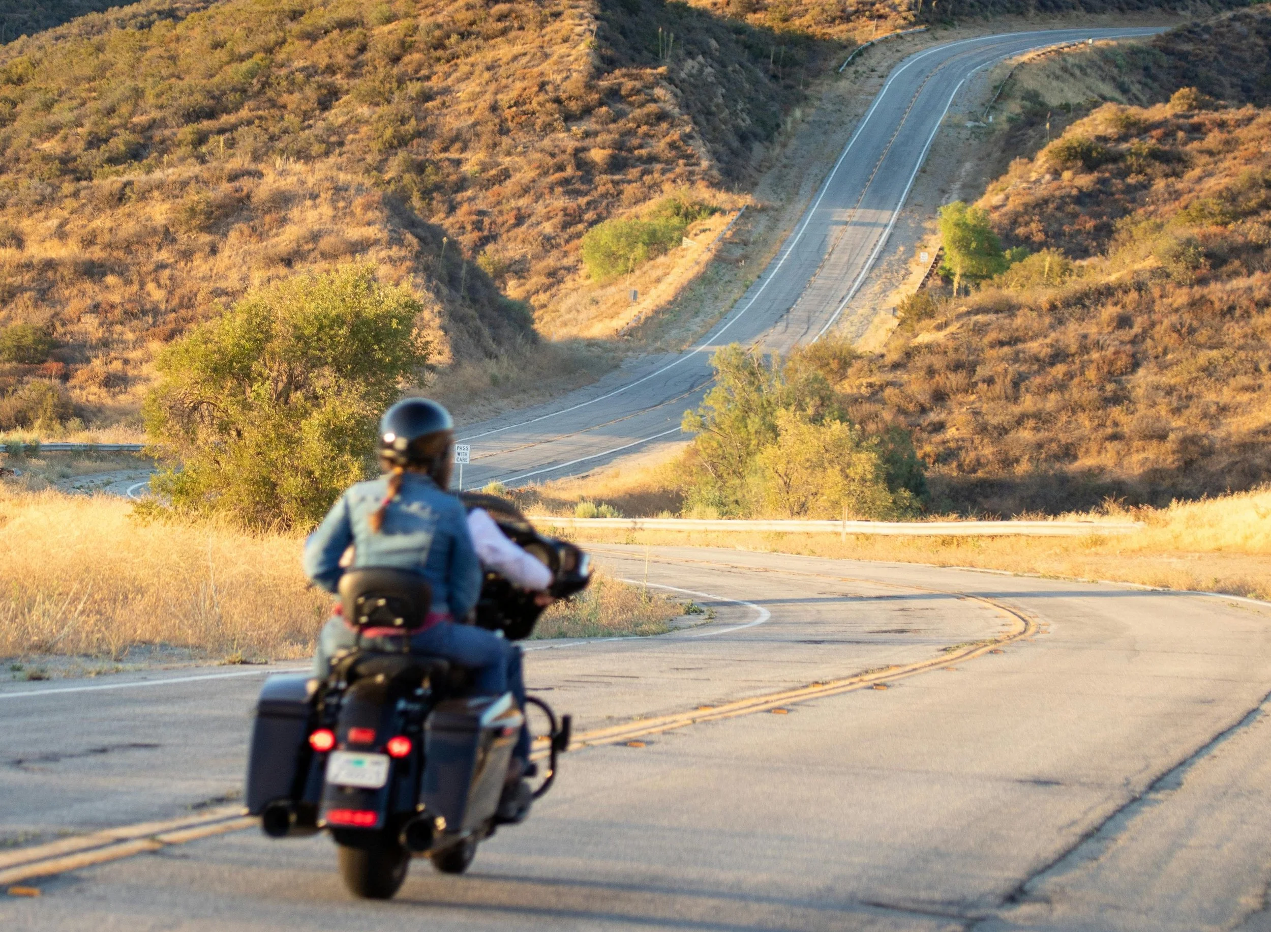 Touring motorcycle on a winding California road
