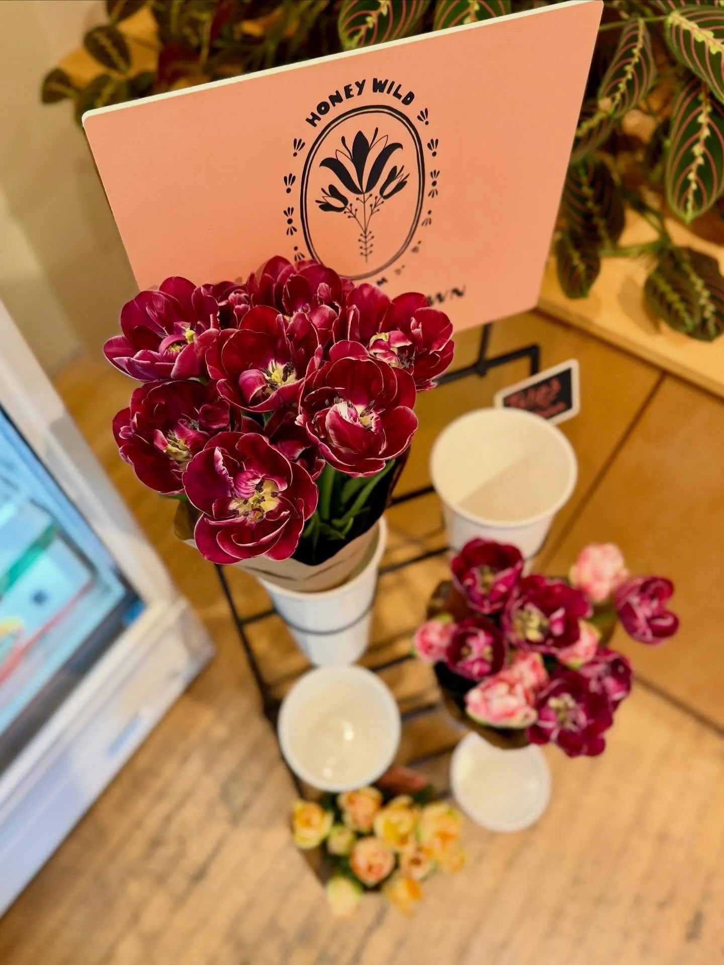 Did you know we sell the prettiest tulips in all the land. And our vanilla cheesecake is the most delicious dessert in the whole wide world. We will expect to see you soon. #honeywildfarm #cheesecake #espresso