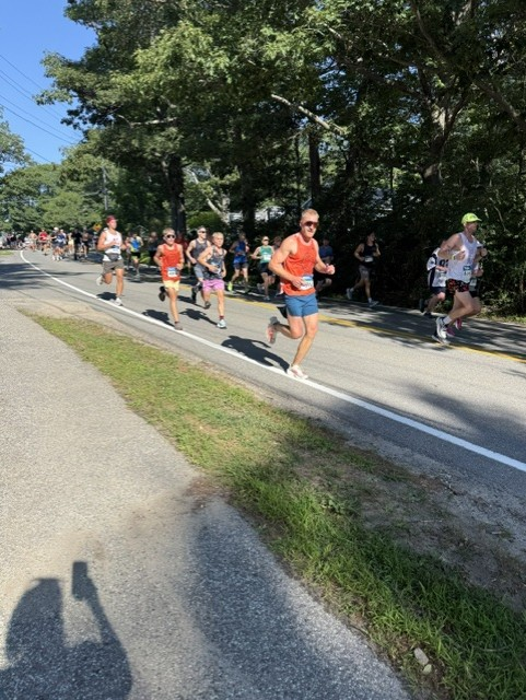 Runners competing in a 10k road race