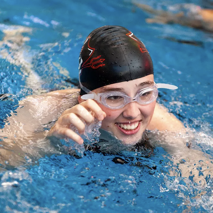 Rare development disorder hasn’t kept Wellesley swimmer from varsity