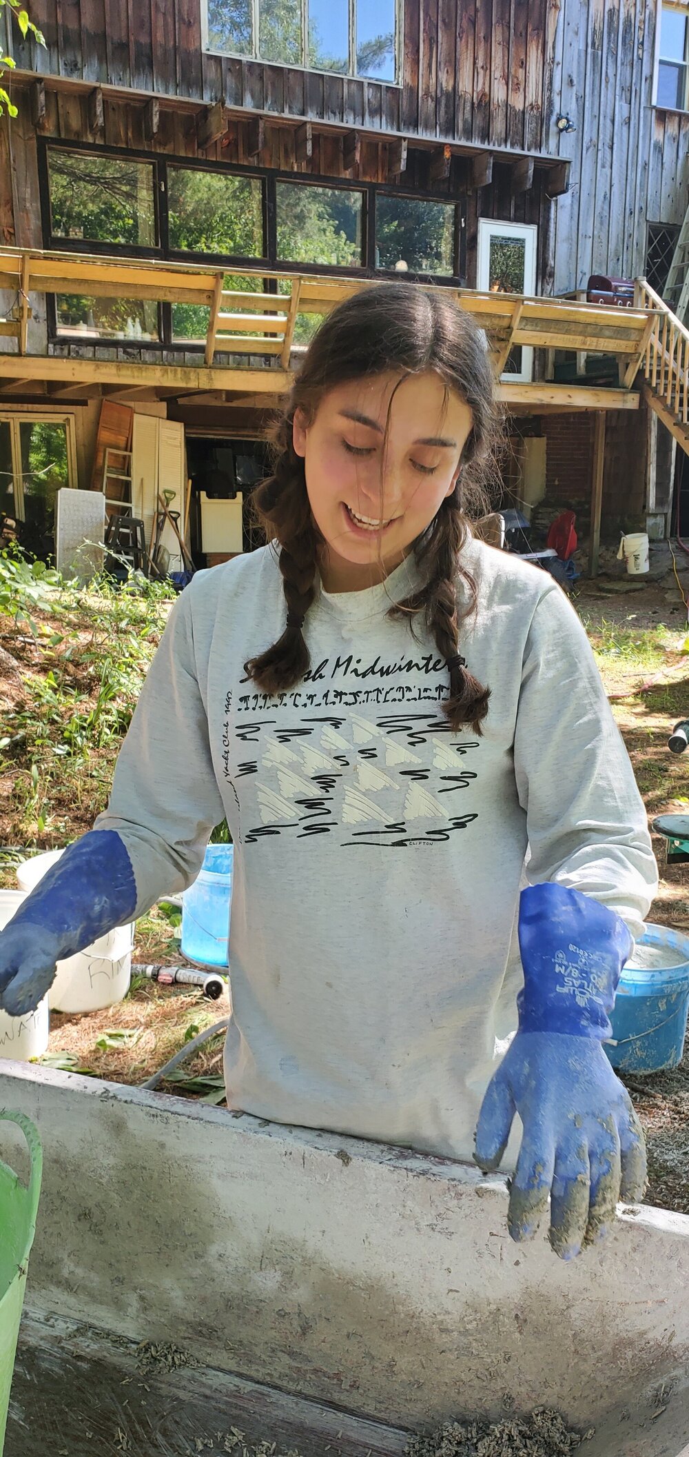 Natalie after getting the hempcrete mixture to the perfect hydration