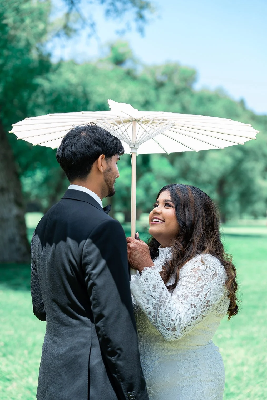 Bride and groom gaze at each other while taking Redwood Canyon wedding photos