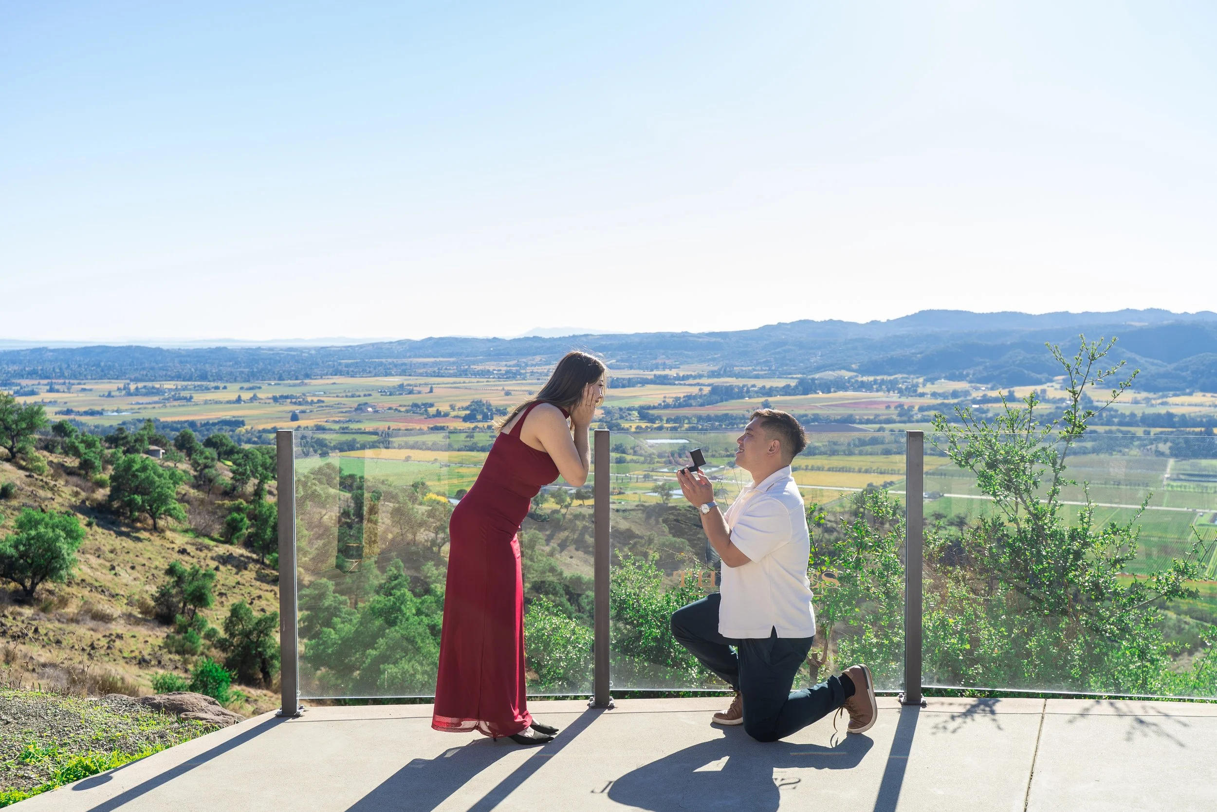 Boyfriend proposing to his girlfriend at The Caves at Soda Canyon in Napa Valley
