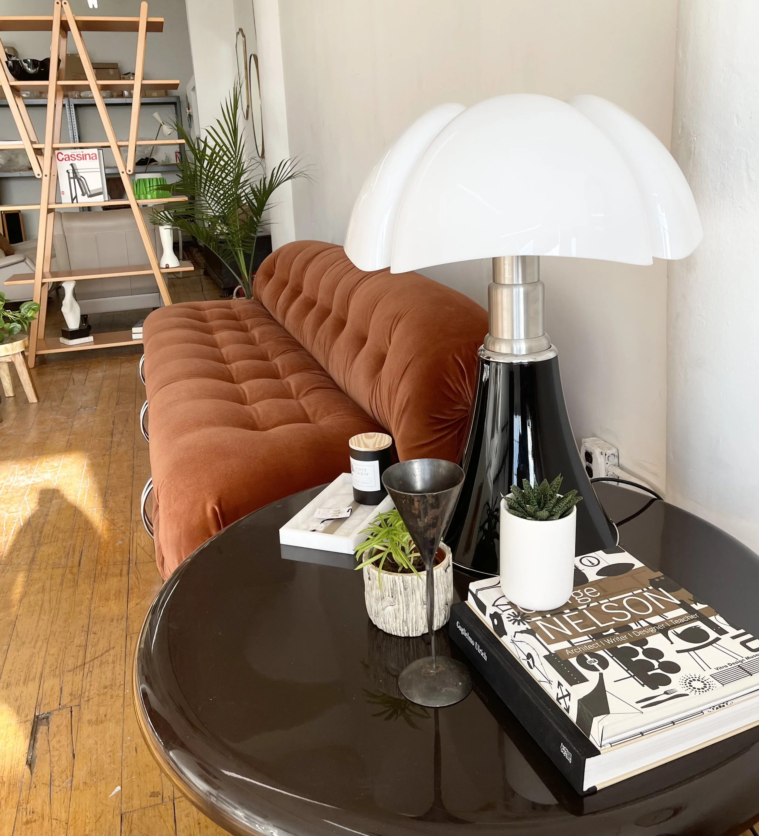 Gae Aulenti Pipistrello Table Lamp Large Brown | on black coffee table