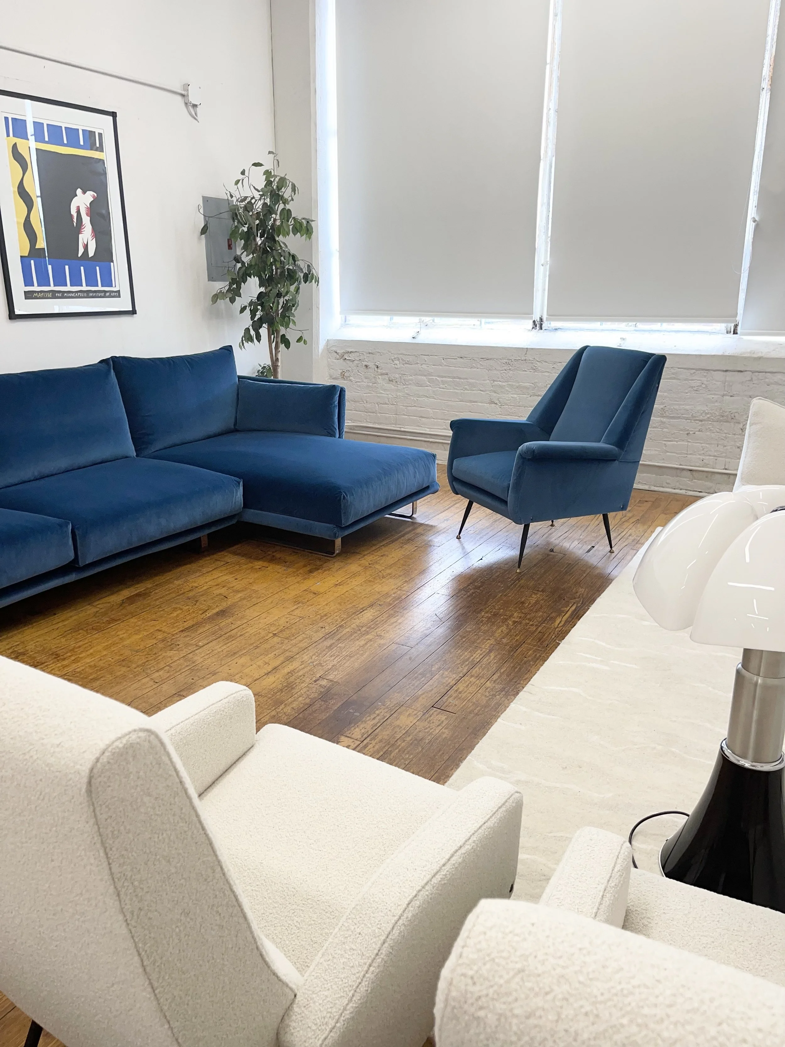 Italian Mid Century Furniture at Designitalia: Italian Vintage Sofa by Arflex next to chair