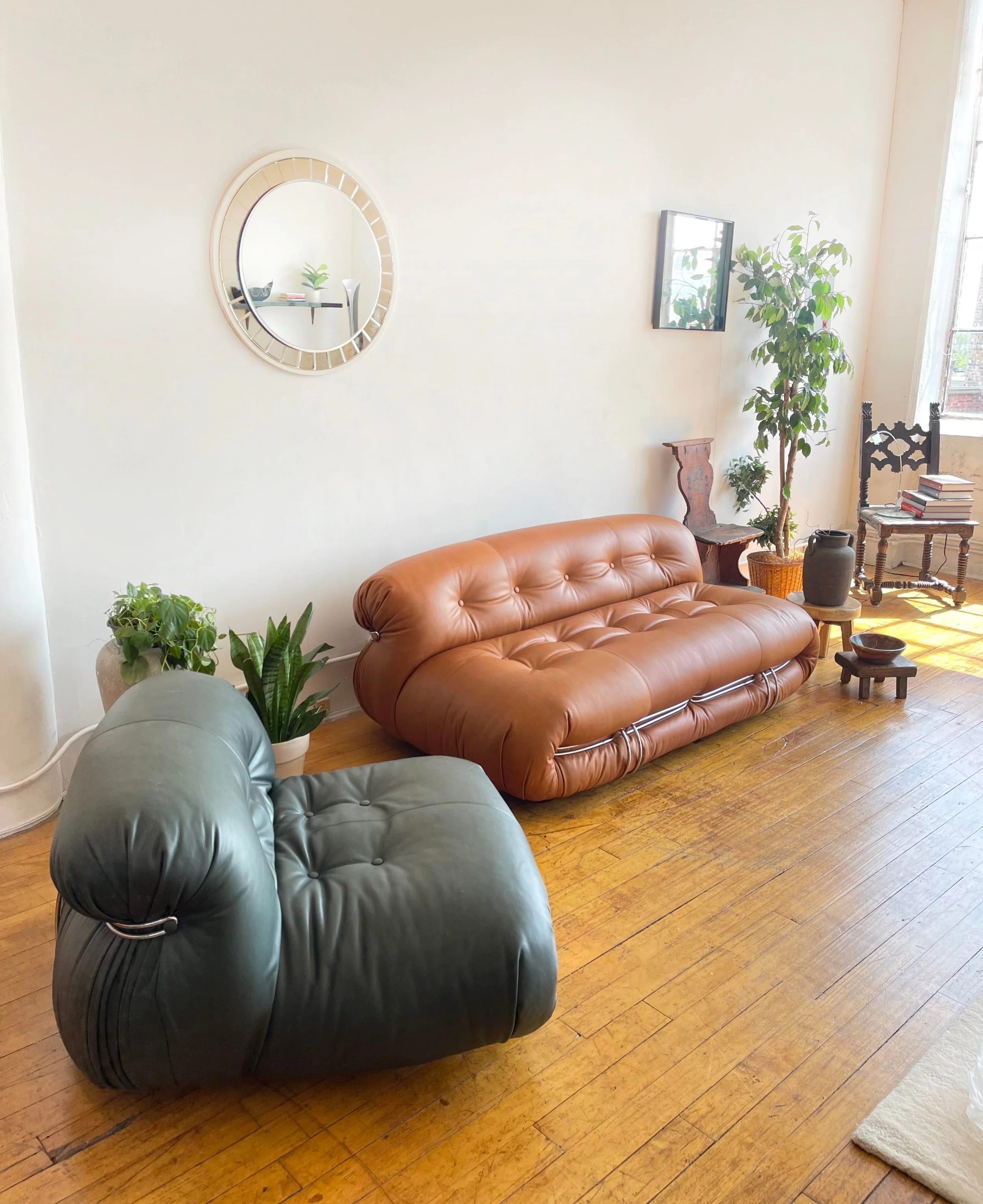 Vintage Soriana Chair Cassina 5105 in room with sofa