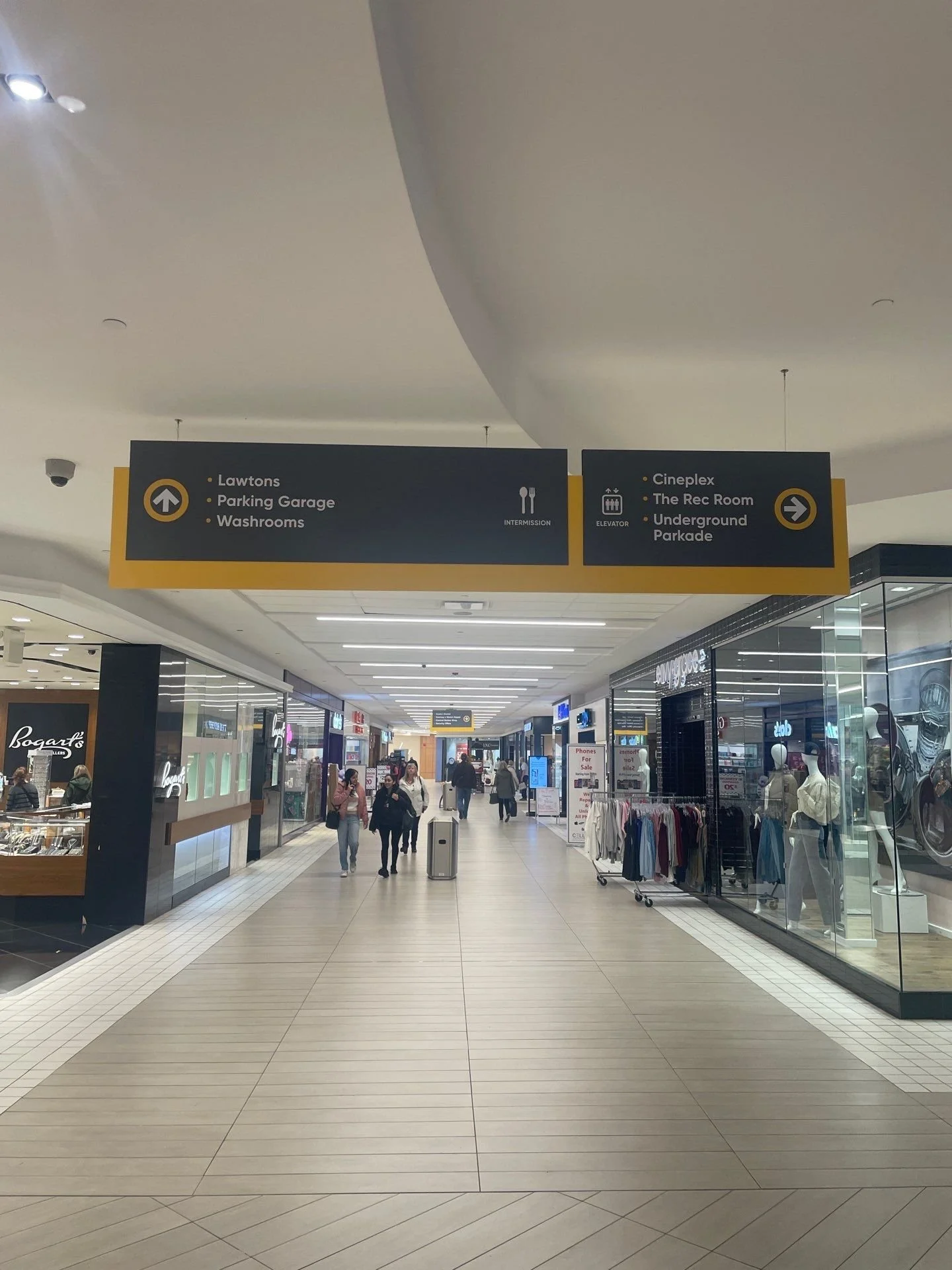 Hanging wayfinding signs for the Avalon Mall
