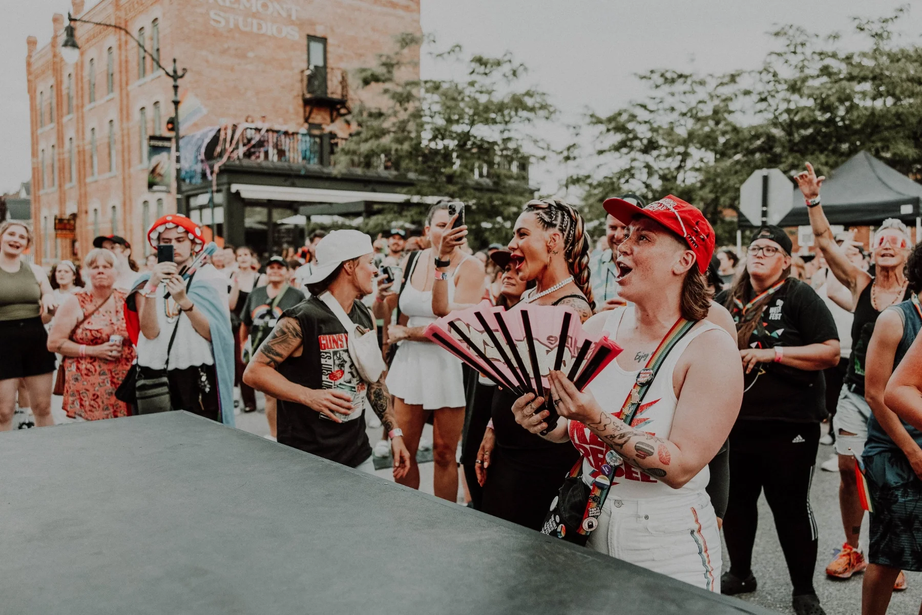 Excited crowd with fans
