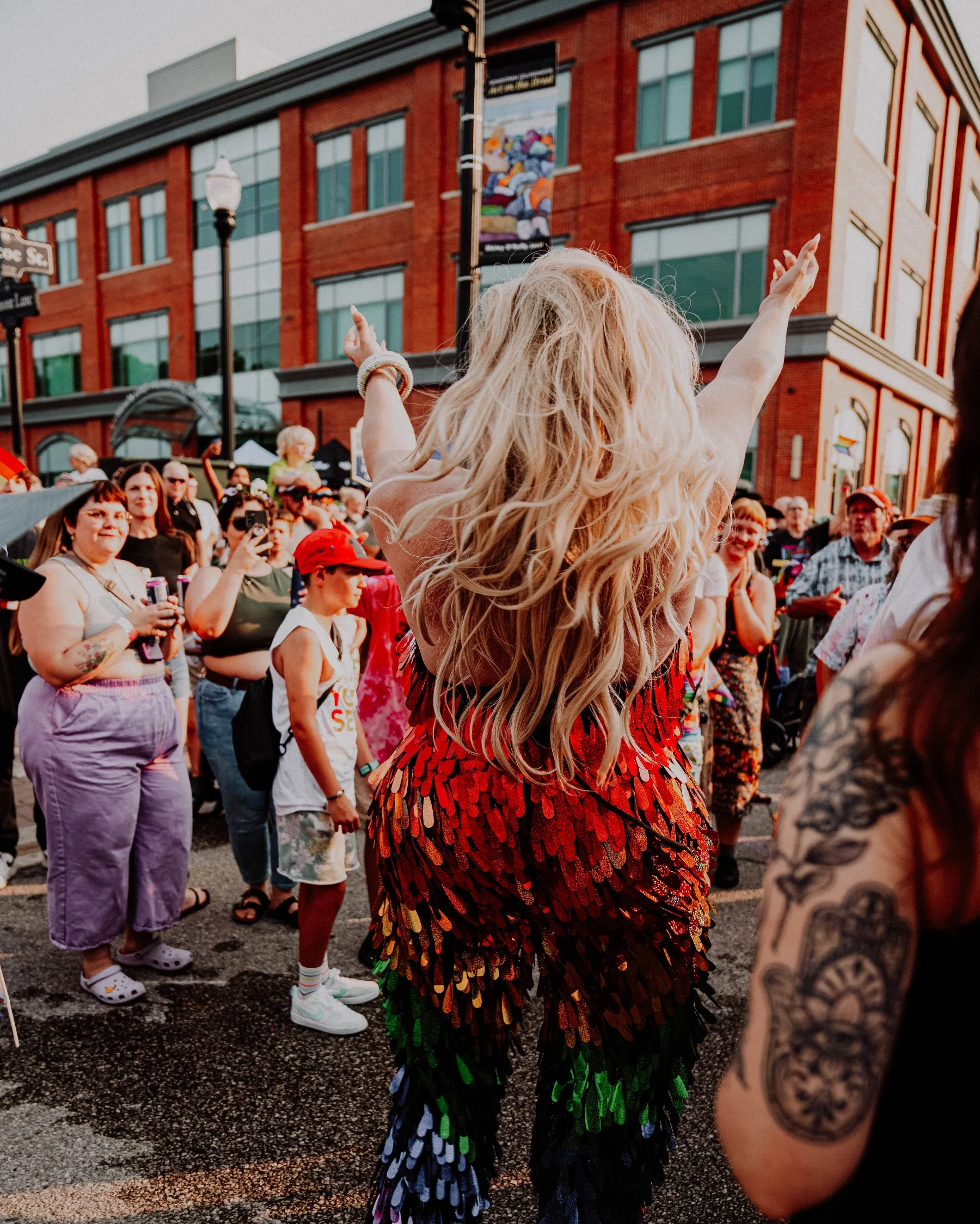 Performer in rainbow sequins