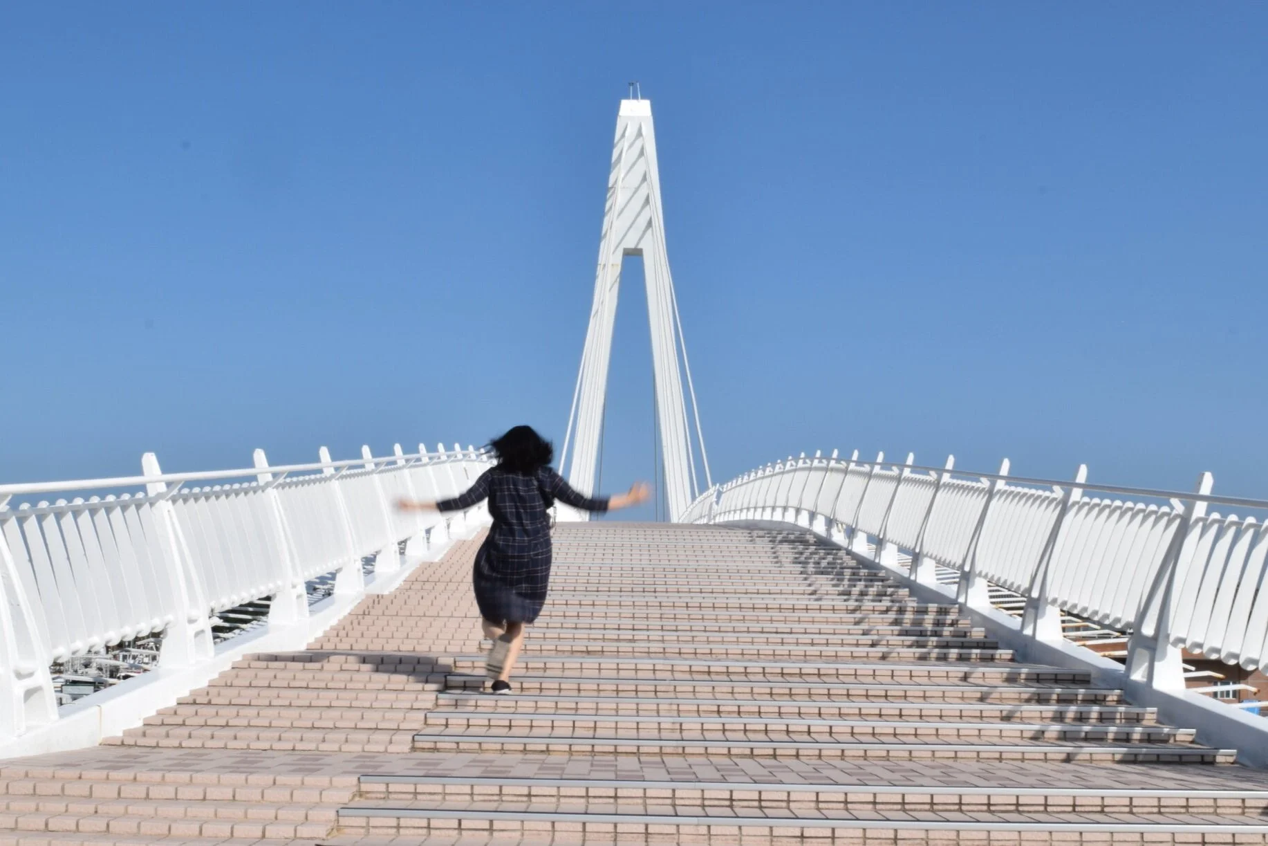 Racing to cross the Tamsui Lovers Bridge. Taipei, Taiwan.