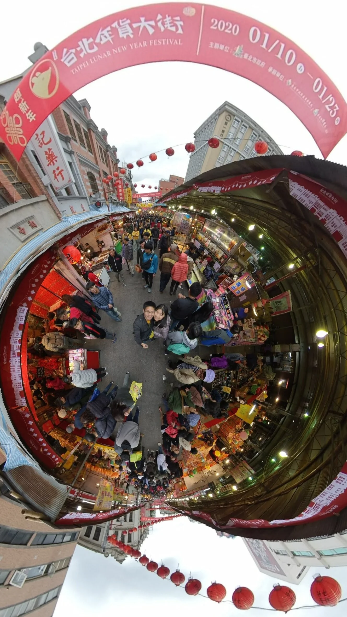 Looking up from the busy street.